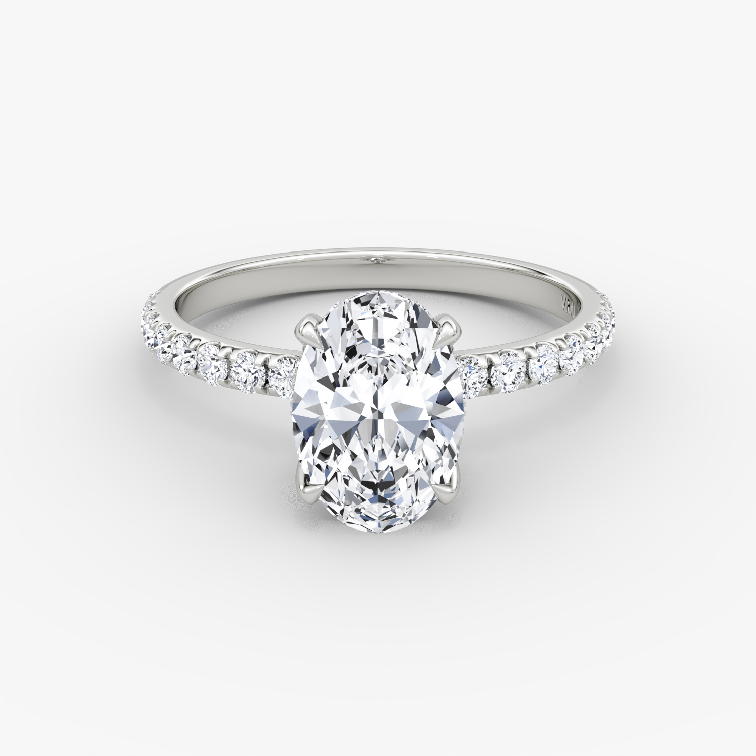 The Classic Hidden Halo | Oval | Platinum | bandAccent: Pavé | bandWidth: large | prongStyle: Plain | diamondOrientation: vertical | caratWeight: other