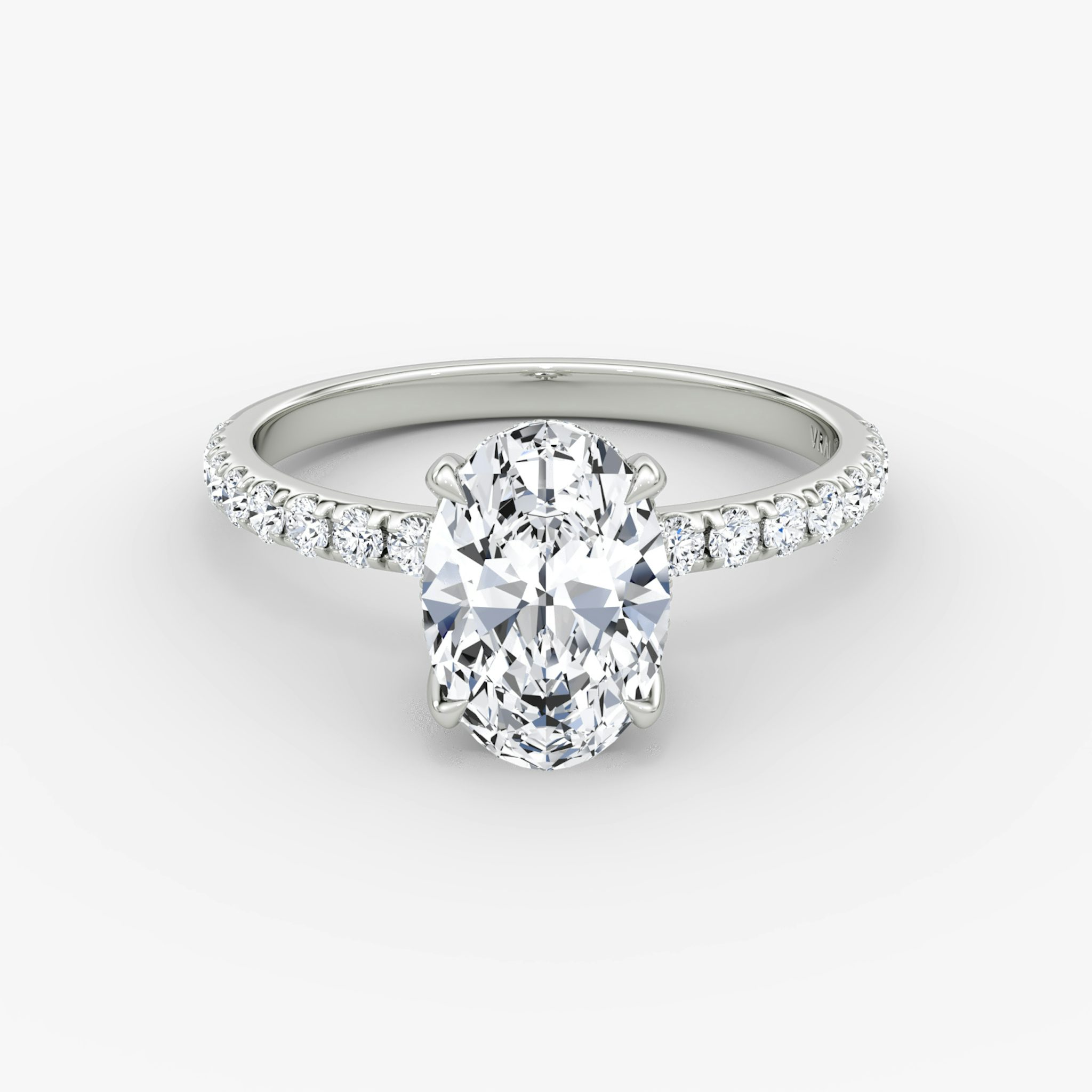 The Classic Hidden Halo | Oval | Platinum | bandAccent: Pavé | bandWidth: large | prongStyle: Plain | diamondOrientation: vertical | caratWeight: other