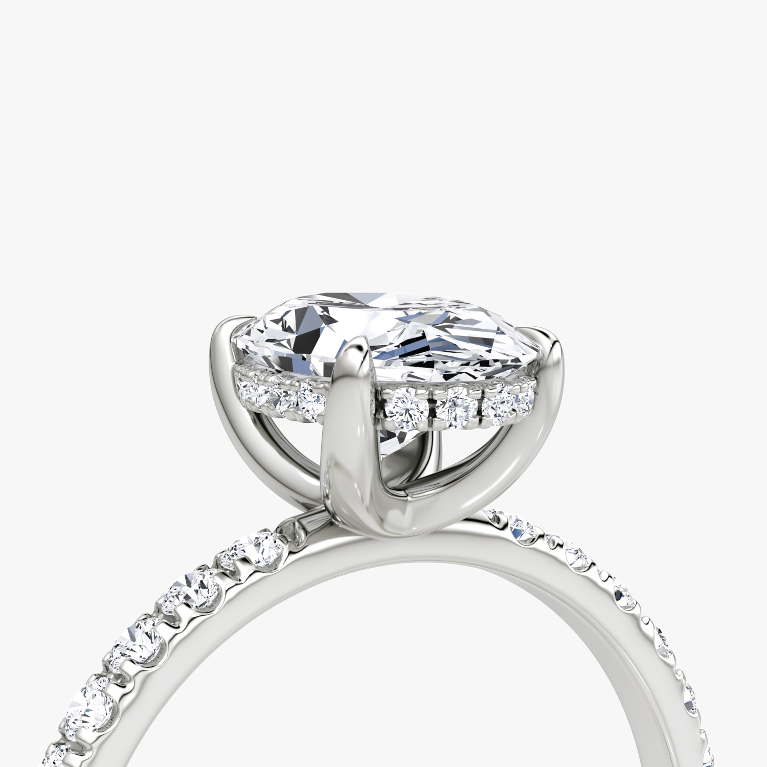 The Classic Hidden Halo | Oval | Platinum | bandAccent: Pavé | bandWidth: large | prongStyle: Plain | diamondOrientation: vertical | caratWeight: other