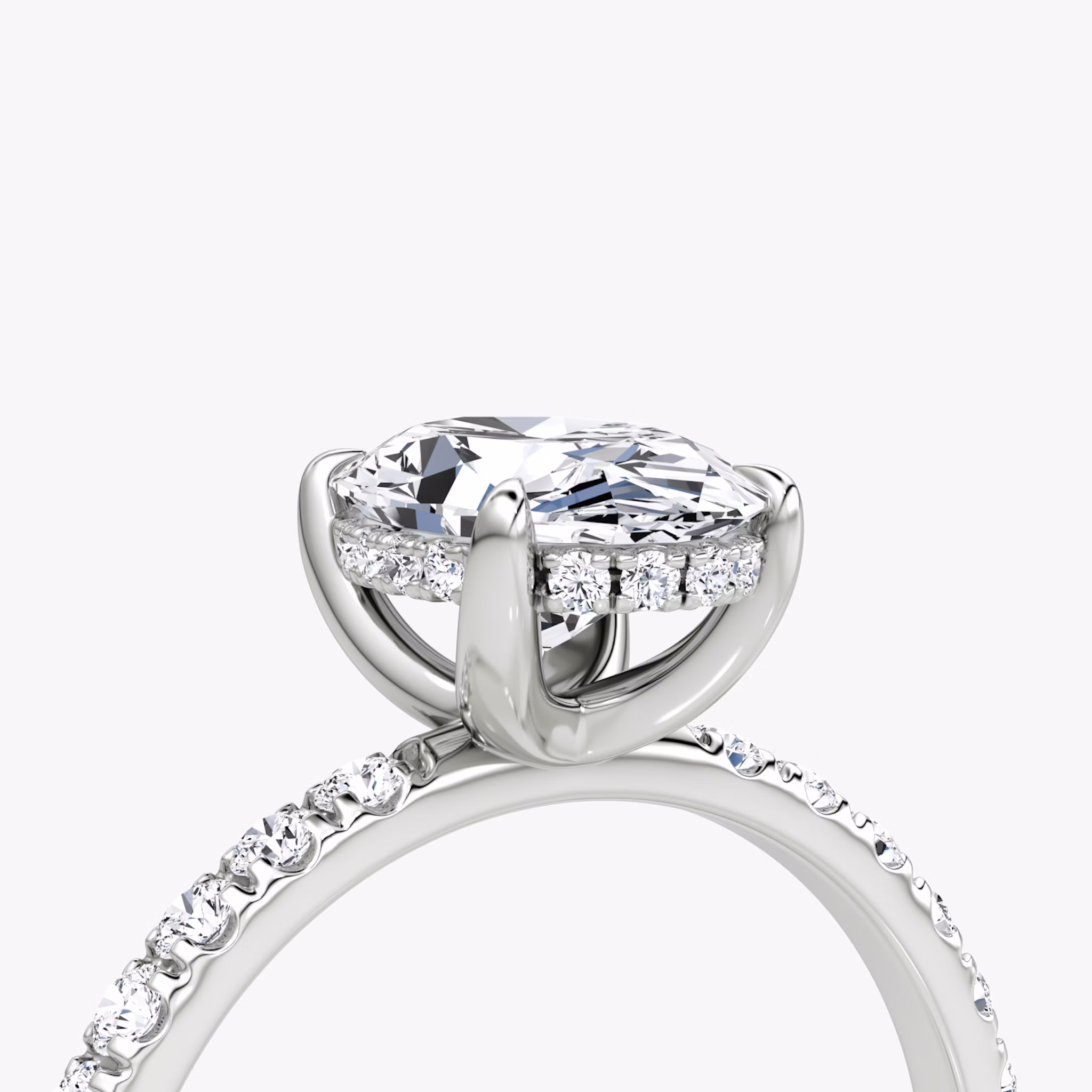 The Classic Hidden Halo | Oval | Platinum | bandAccent: Pavé | bandWidth: large | prongStyle: Plain | diamondOrientation: vertical | caratWeight: other