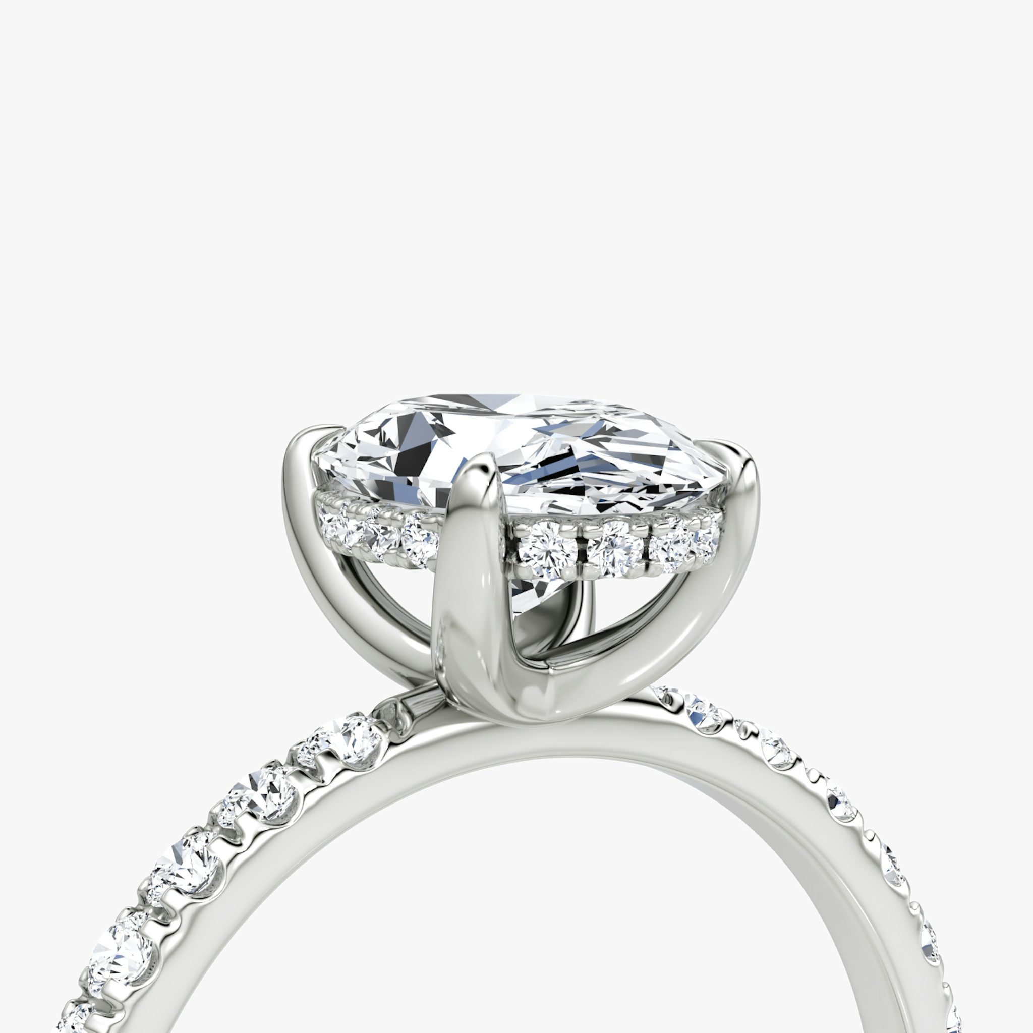 The Classic Hidden Halo | Oval | Platinum | bandAccent: Pavé | bandWidth: large | prongStyle: Plain | diamondOrientation: vertical | caratWeight: other