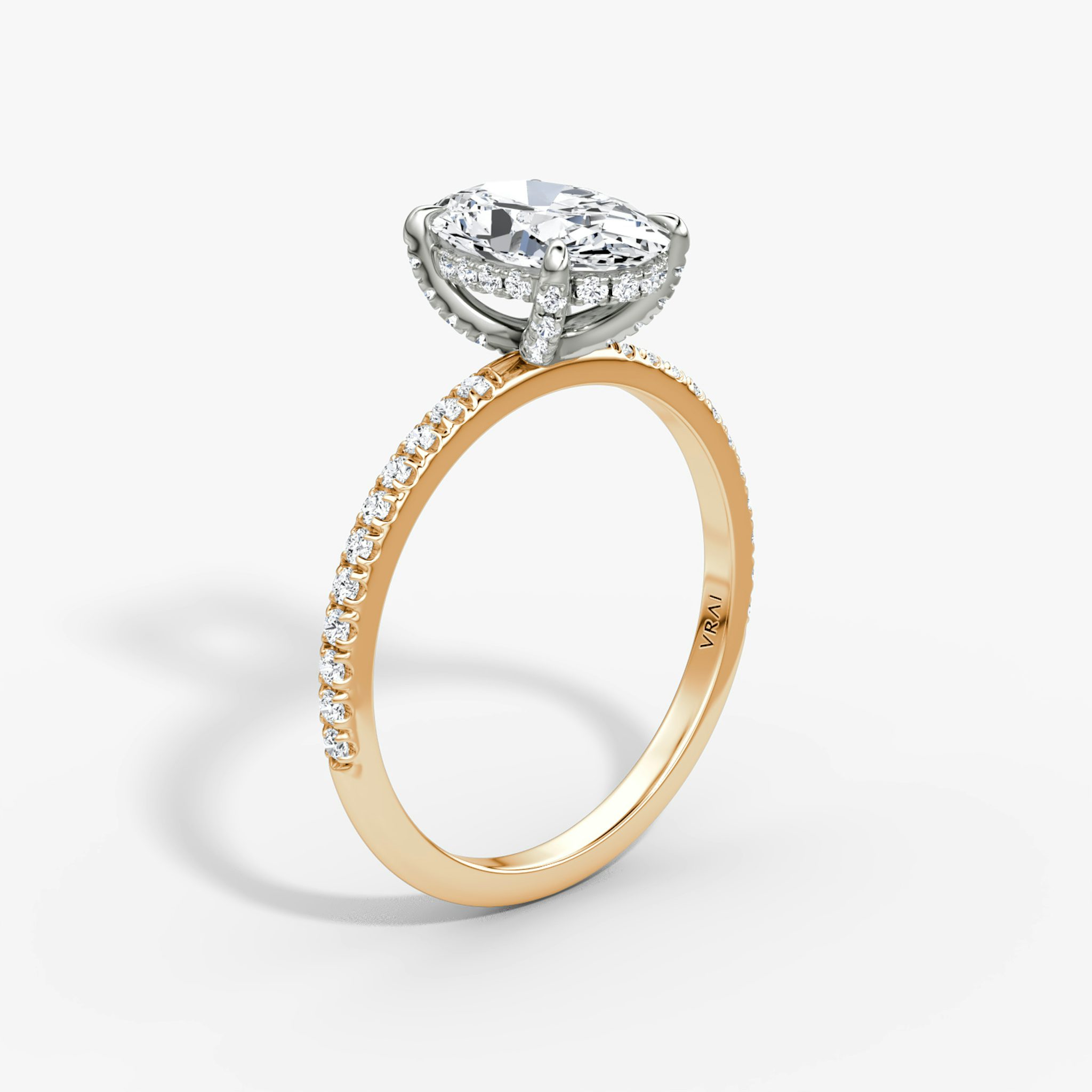 The Classic Hidden Halo | Oval | 14k | Rose Gold and Platinum | bandAccent: Pavé | bandWidth: standard | prongStyle: Pavé | diamondOrientation: vertical | caratWeight: other