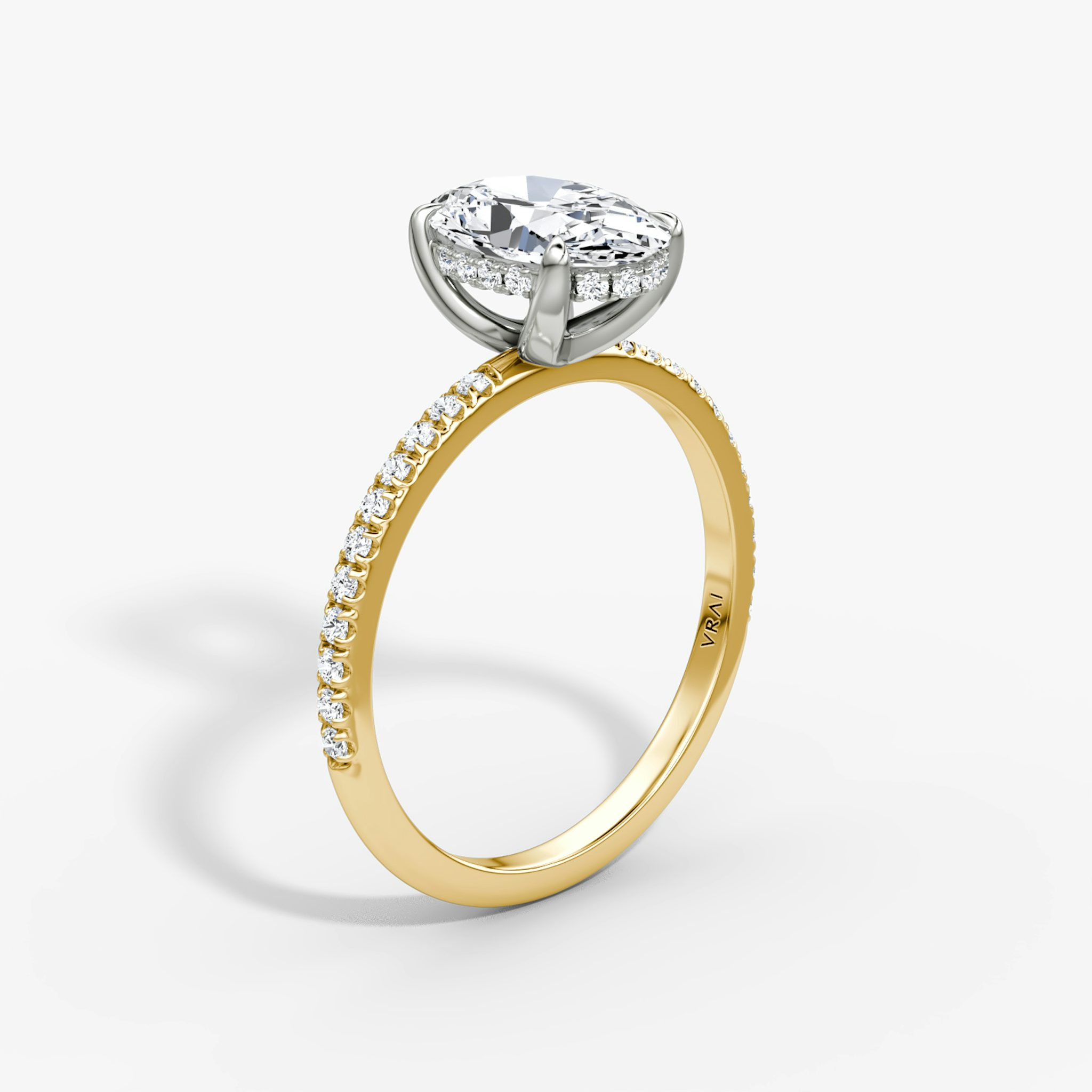 Anillo de compromiso Classic Hidden Halo | Oval | 18k | Oro amarillo y platino | bandAccent: Pavé | bandWidth: standard | prongStyle: Simple | diamondOrientation: vertical | caratWeight: other