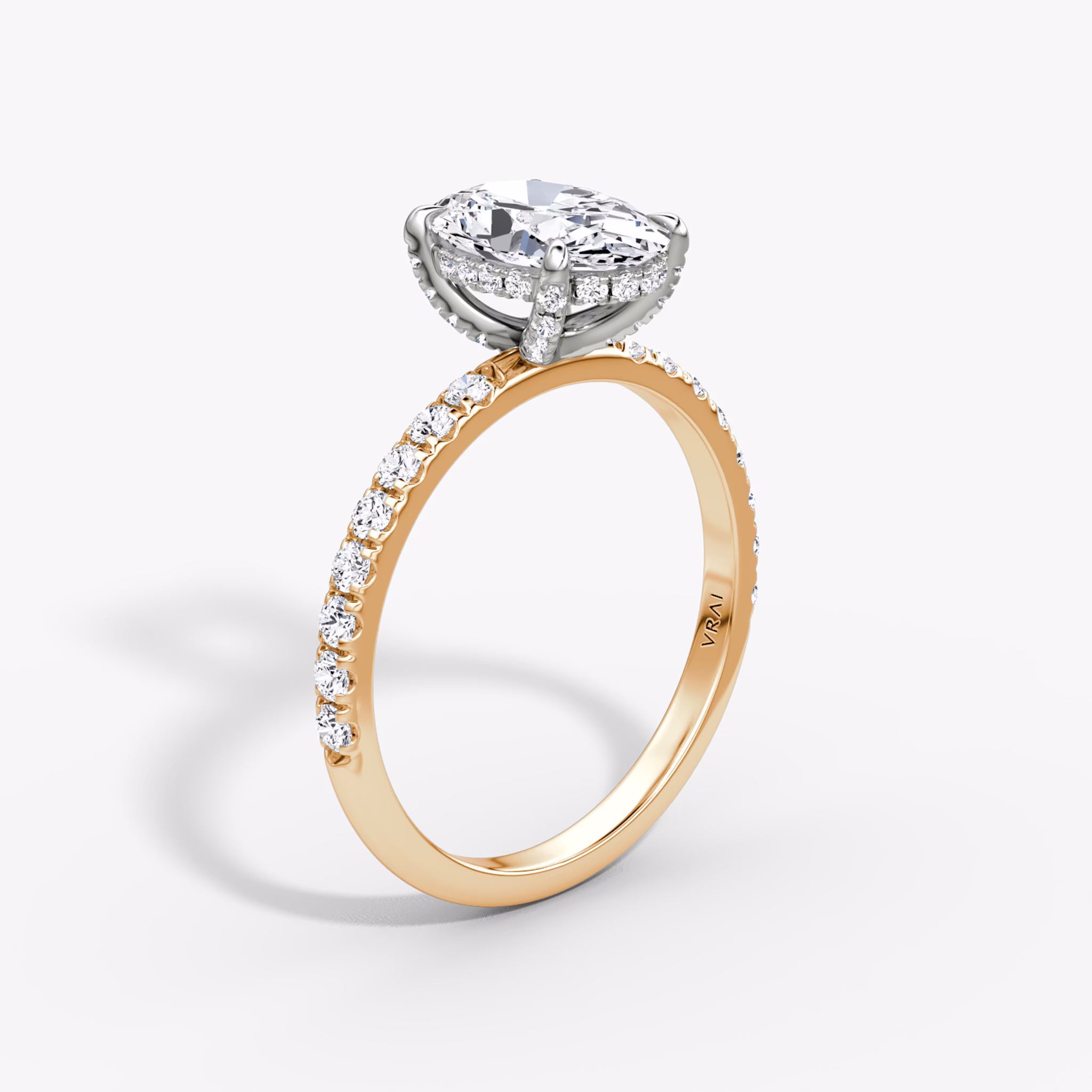 Anillo de compromiso Classic Hidden Halo | Oval | 14k | Oro rosa y platino | bandAccent: Pavé | bandWidth: large | prongStyle: Pavé | diamondOrientation: vertical | caratWeight: other