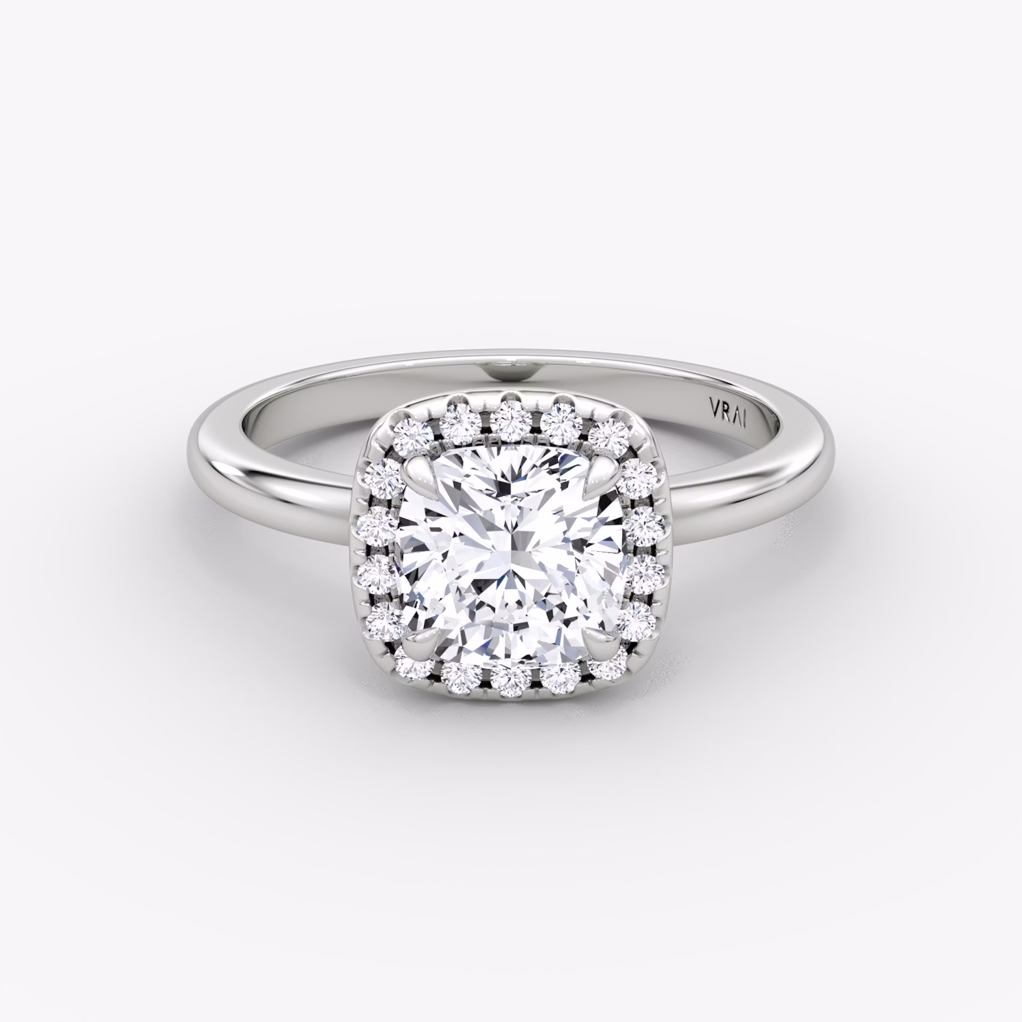 The Halo | Cushion | Platinum | bandAccent: Plain | haloSize: original | diamondOrientation: vertical | caratWeight: other