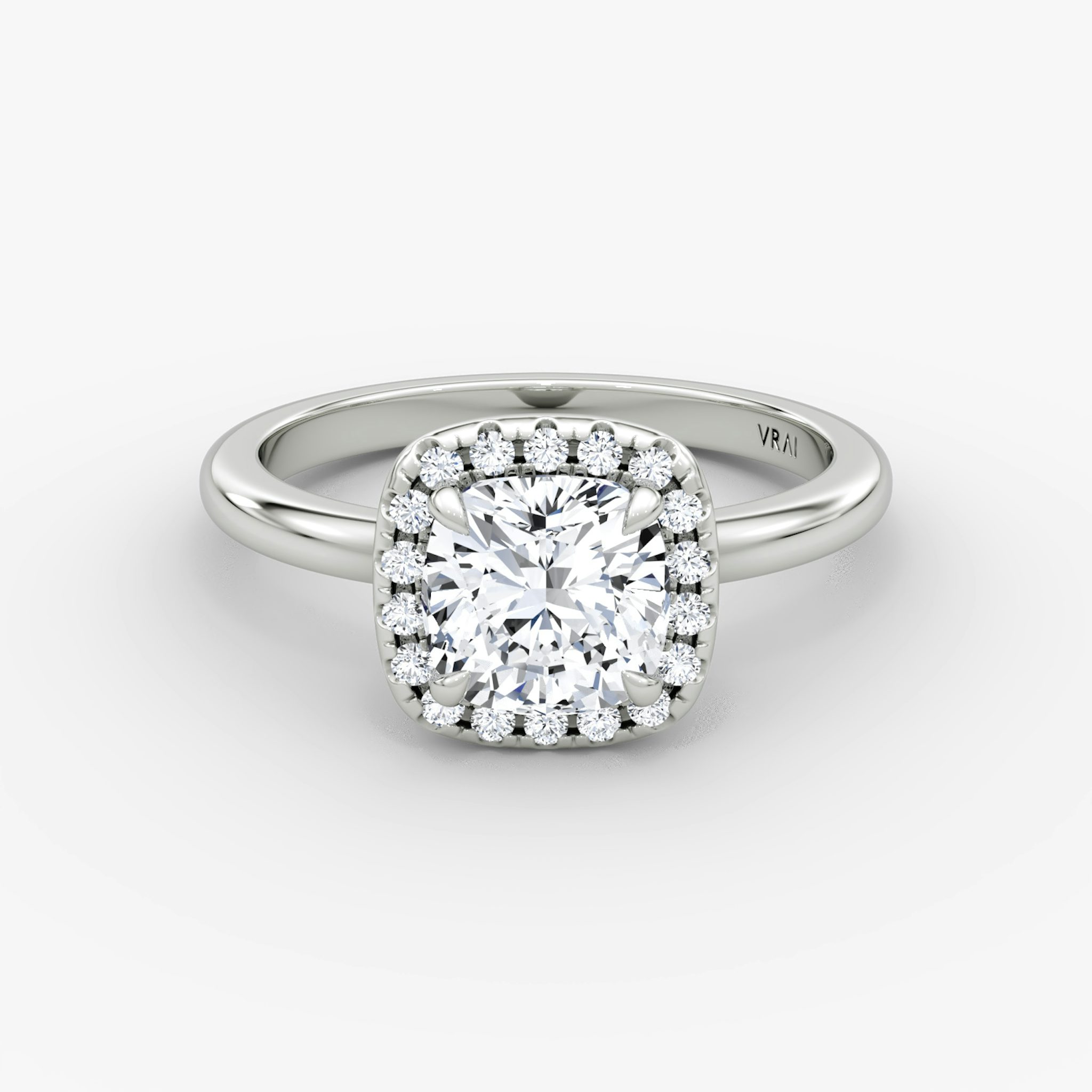 The Halo | Cushion | Platinum | bandAccent: Plain | haloSize: original | diamondOrientation: vertical | caratWeight: other