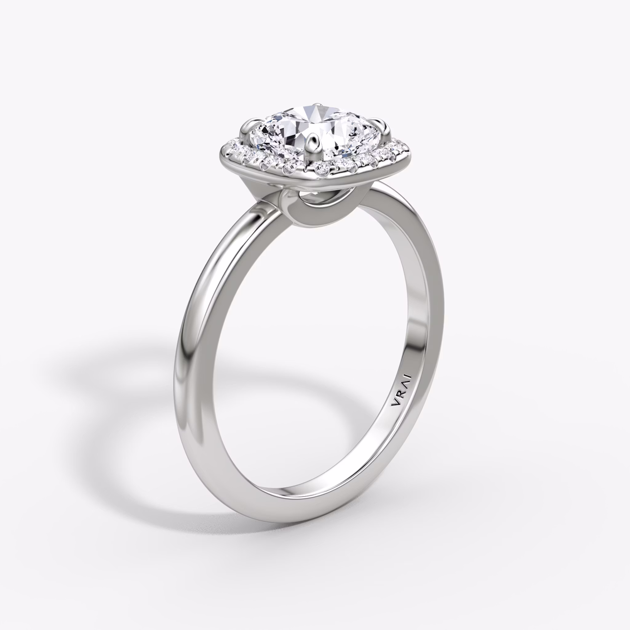 The Halo | Cushion | Platinum | bandAccent: Plain | haloSize: original | diamondOrientation: vertical | caratWeight: other