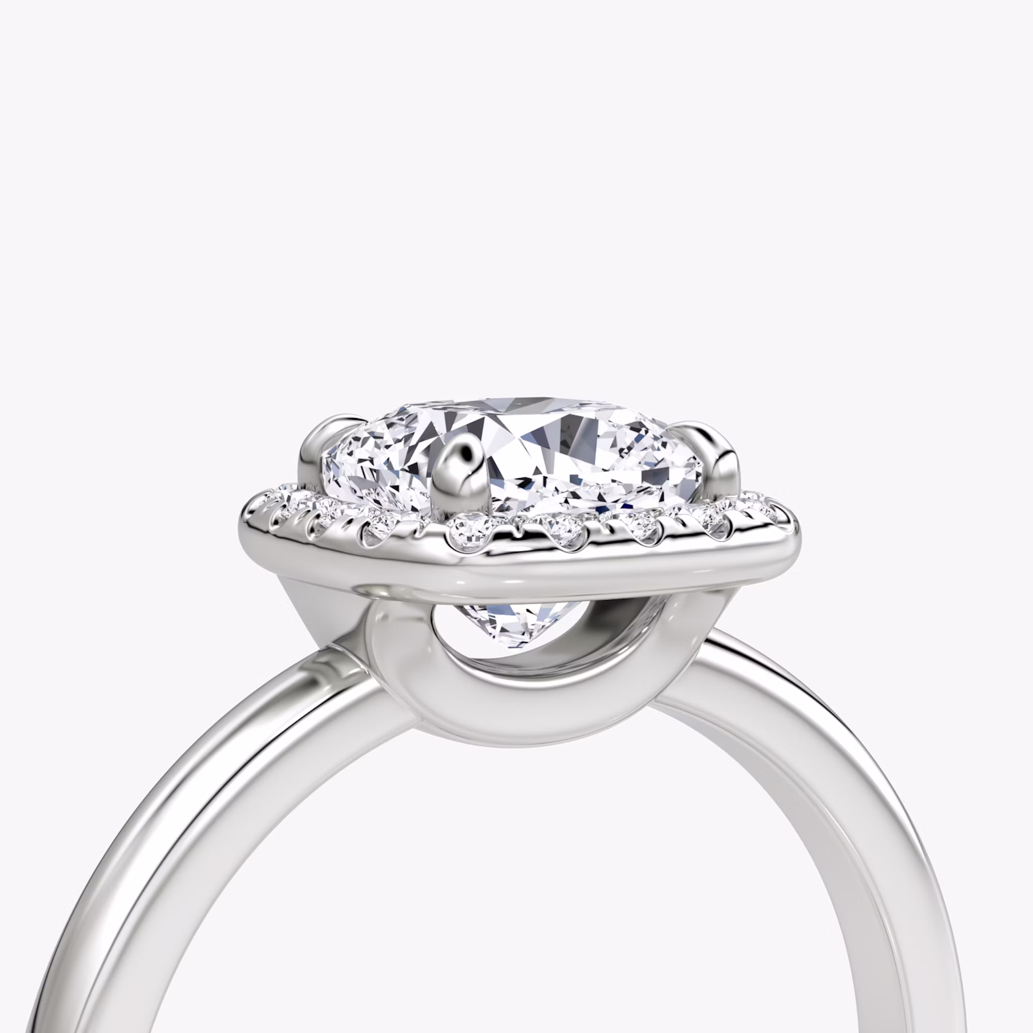 The Halo | Cushion | Platinum | bandAccent: Plain | haloSize: original | diamondOrientation: vertical | caratWeight: other