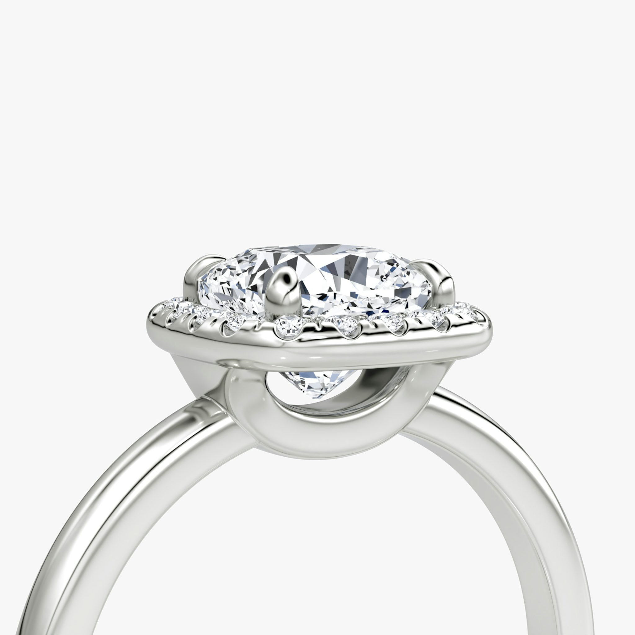 The Halo | Cushion | Platinum | bandAccent: Plain | haloSize: original | diamondOrientation: vertical | caratWeight: other