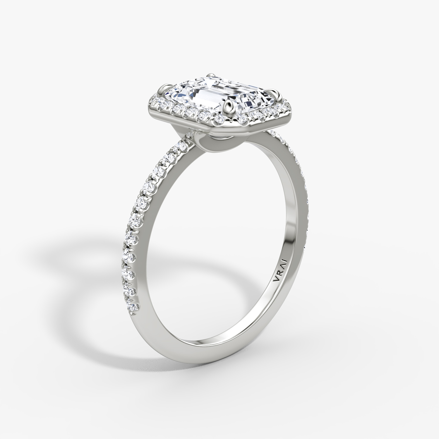 Halo | Emerald | Platin | bandAccent: Mit Pavé-Besatz | haloSize: original | diamondOrientation: vertical | caratWeight: other