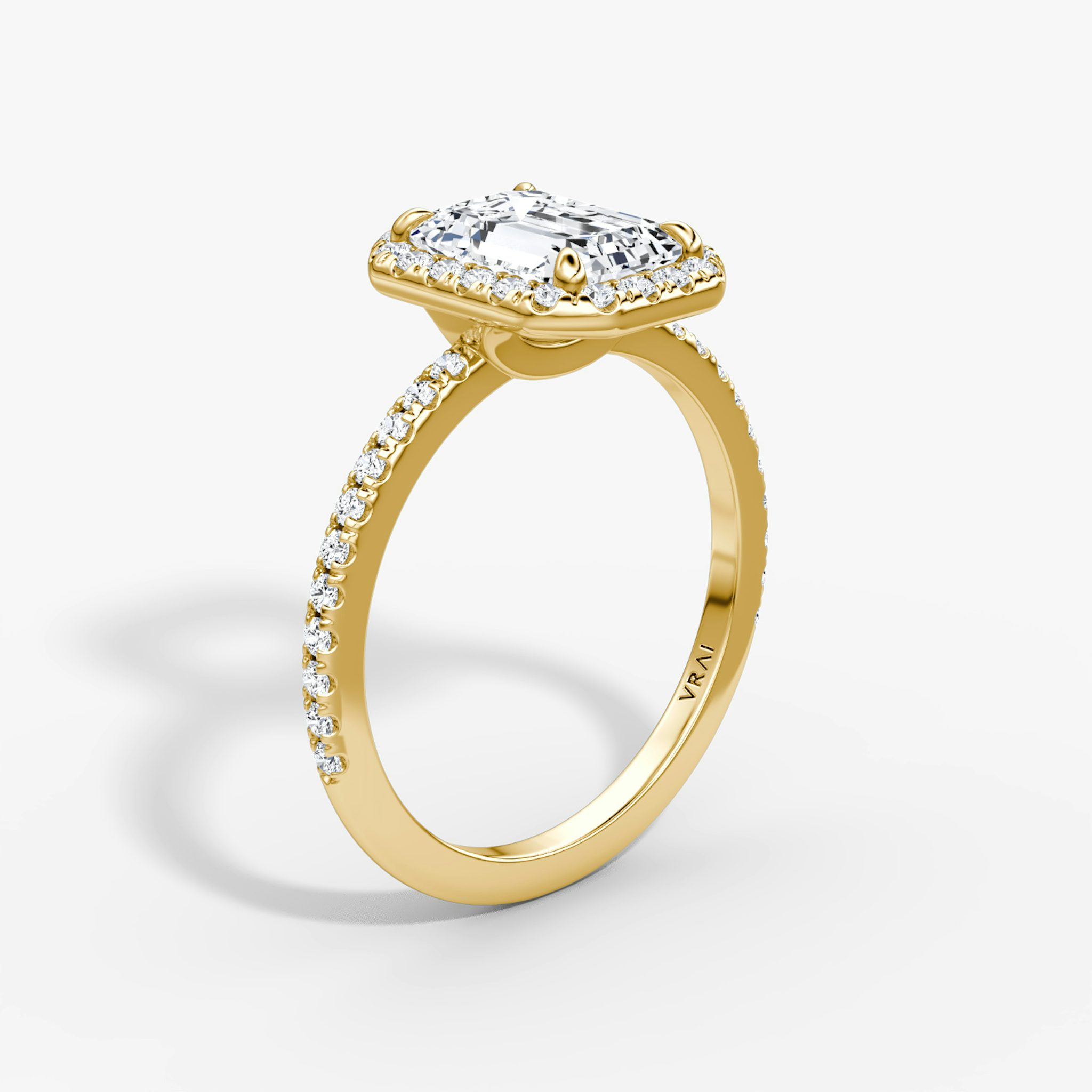 The Halo | Emerald | 18k | Yellow Gold | bandAccent: Pavé | haloSize: original | diamondOrientation: vertical | caratWeight: other