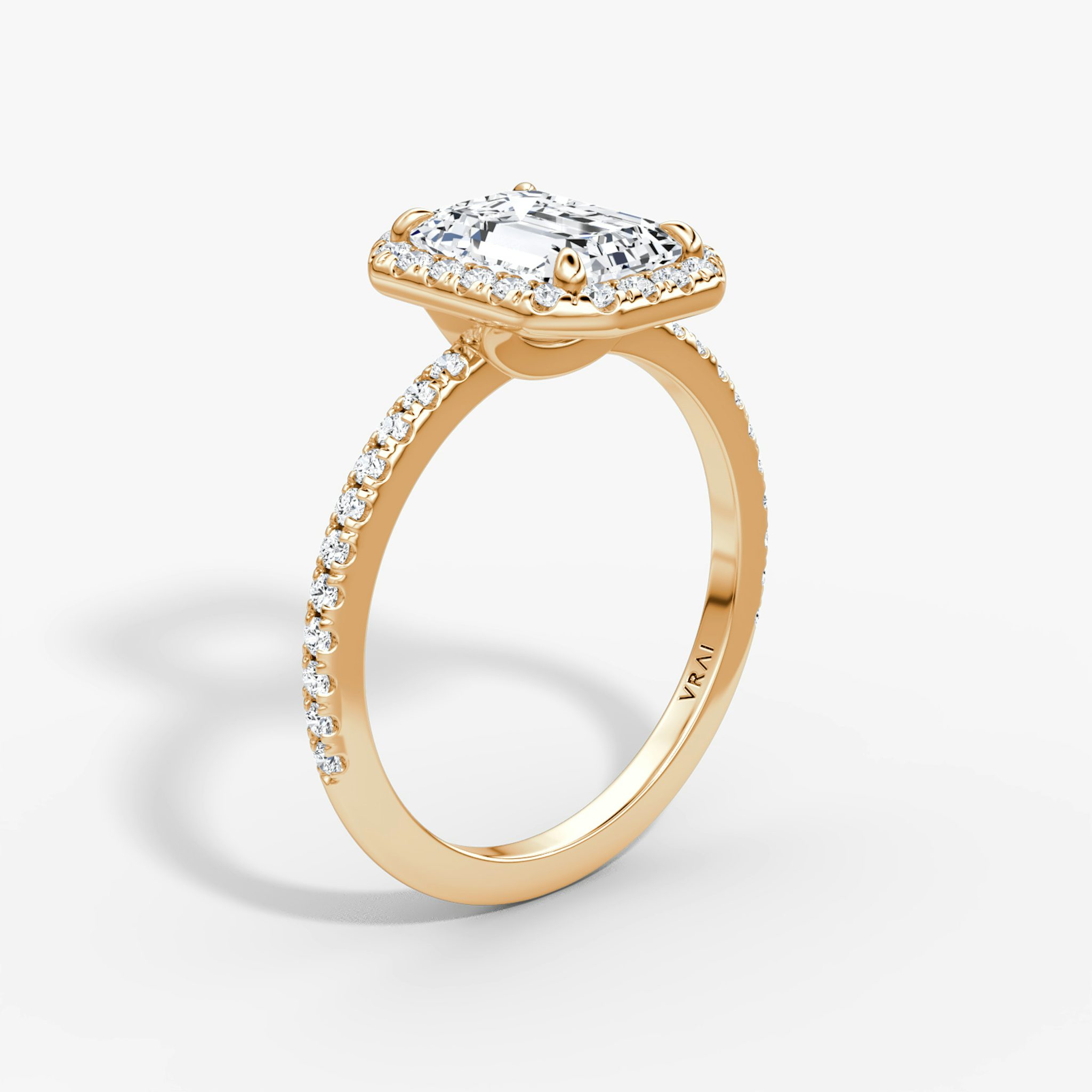 The Halo | Emerald | 14k | Rose Gold | bandAccent: Pavé | haloSize: original | diamondOrientation: vertical | caratWeight: other