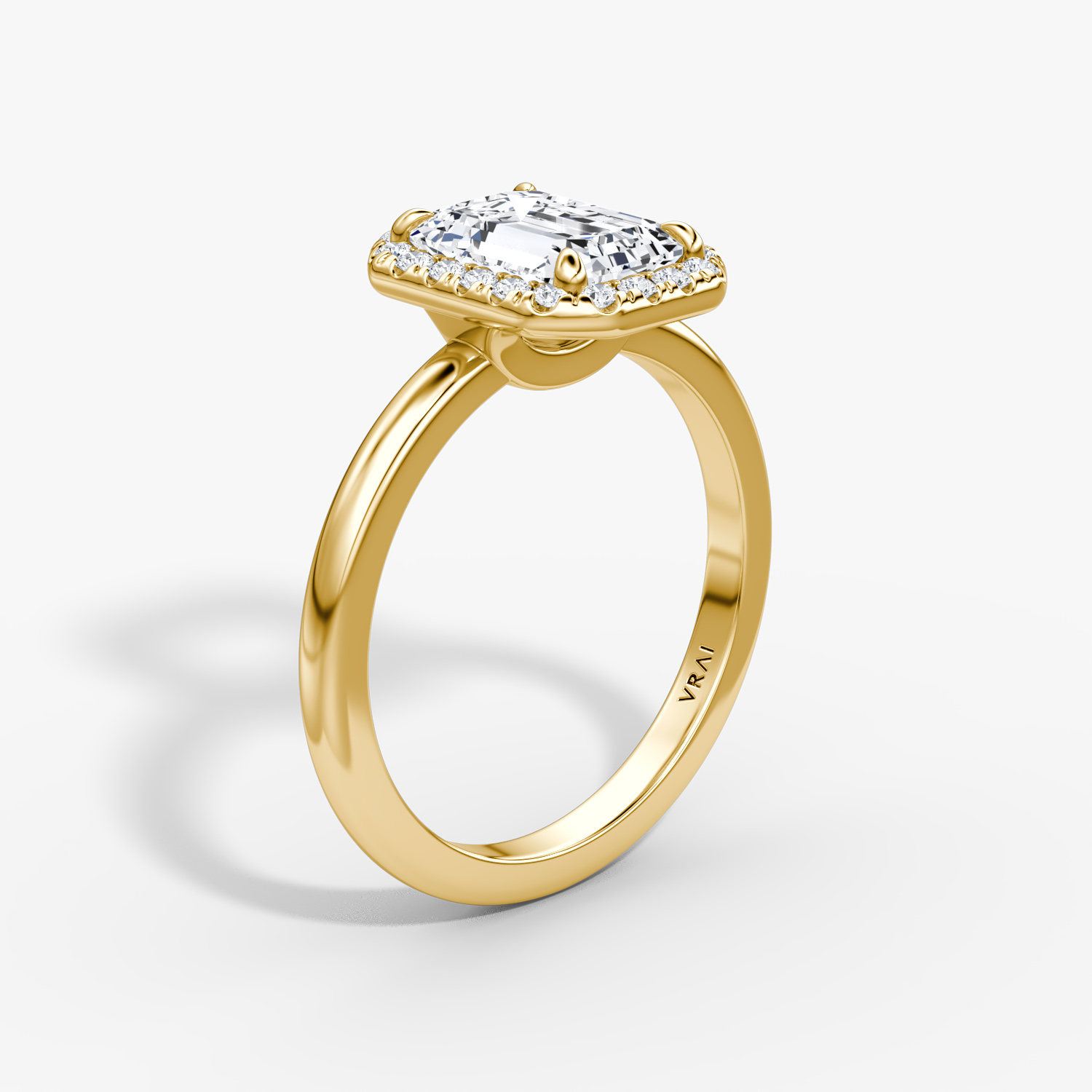 Halo | Emerald | 18k | Gelbgold | bandAccent: Ohne Pavé-Besatz | haloSize: original | diamondOrientation: vertical | caratWeight: other