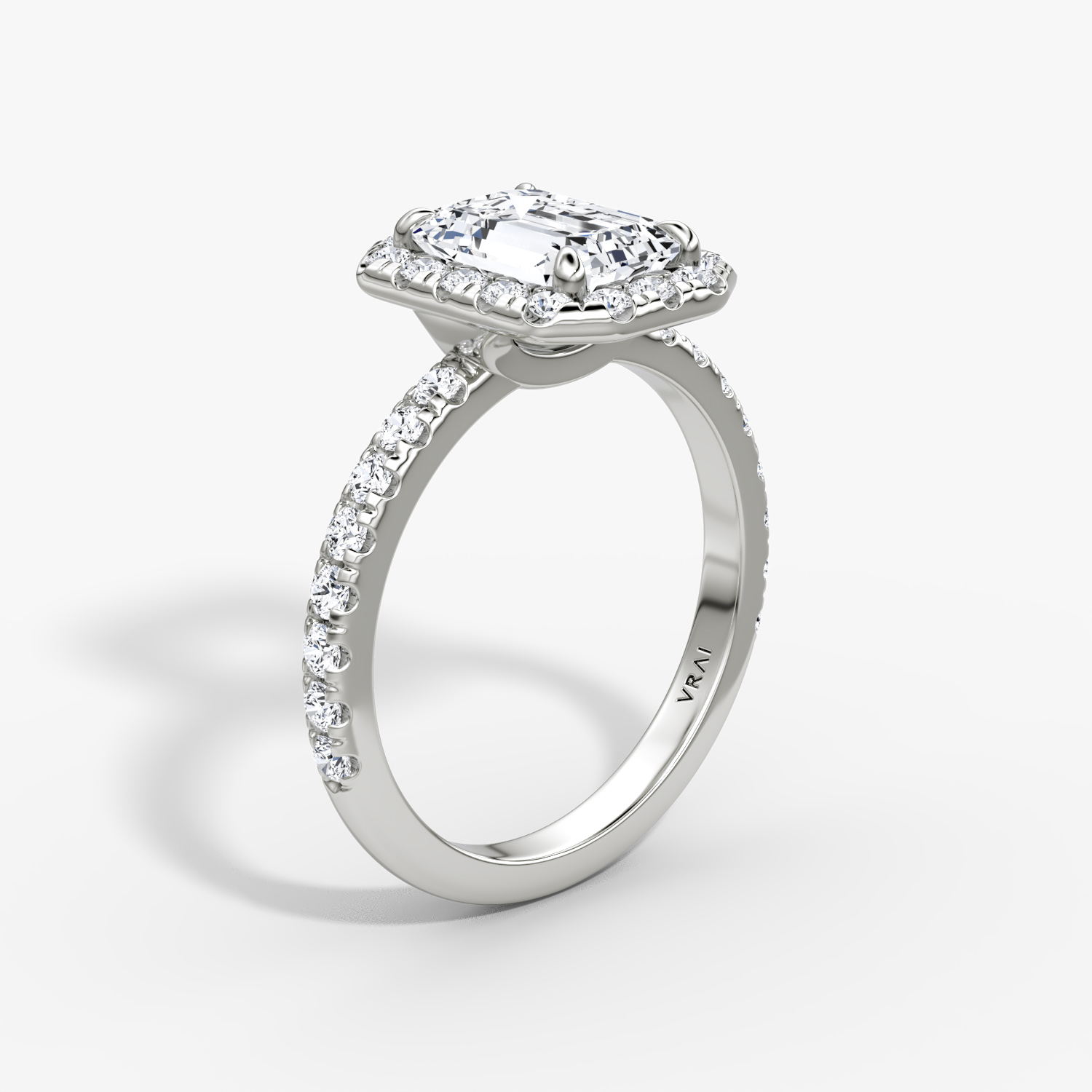 The Halo | Emerald | 18k | White Gold | bandAccent: Pavé | haloSize: large | diamondOrientation: vertical | caratWeight: other