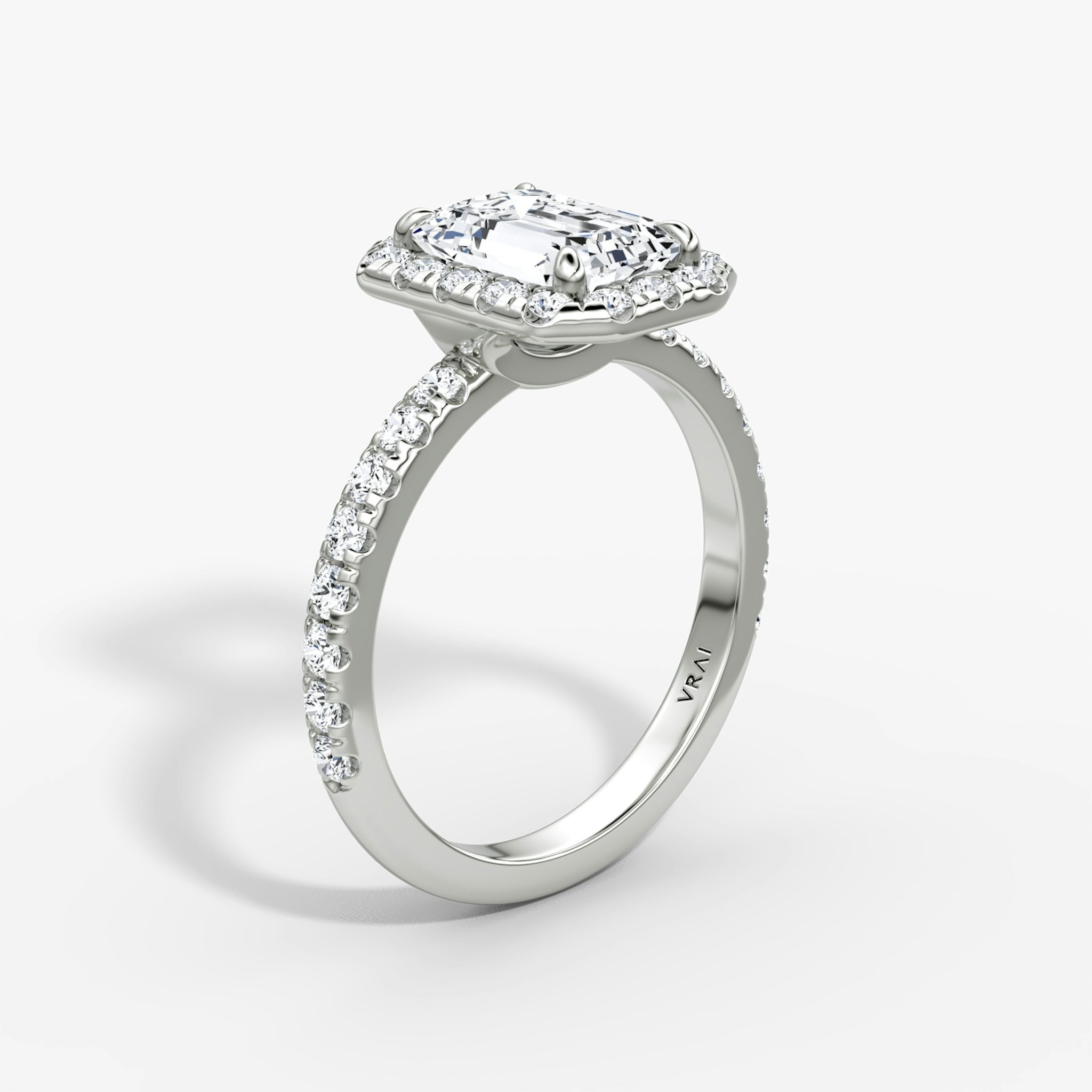 The Halo | Emerald | 18k | White Gold | bandAccent: Pavé | haloSize: large | diamondOrientation: vertical | caratWeight: other