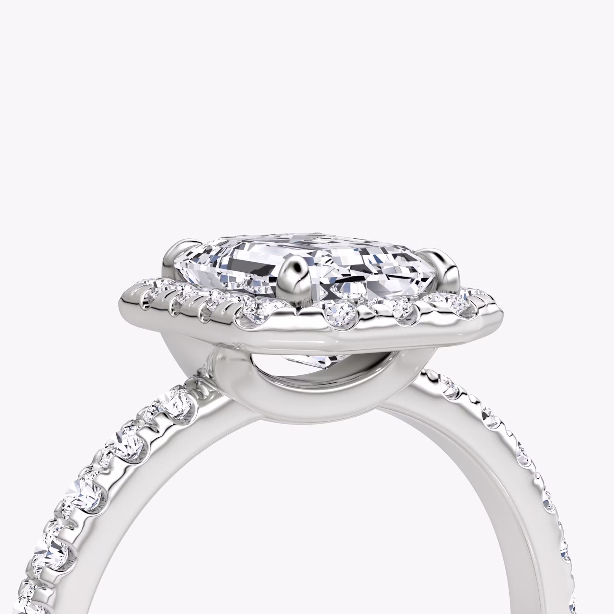 The Halo | Emerald | 18k | White Gold | bandAccent: Pavé | haloSize: large | diamondOrientation: vertical | caratWeight: other