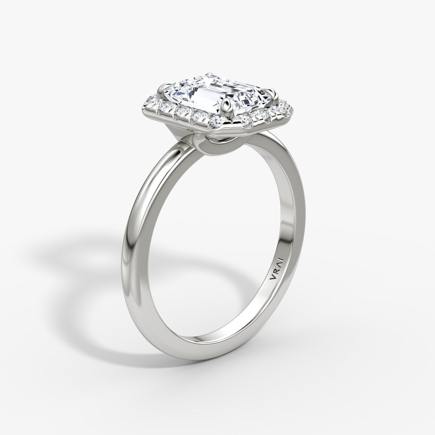 The Halo | Emerald | 18k | White Gold | bandAccent: Plain | haloSize: large | diamondOrientation: vertical | caratWeight: other