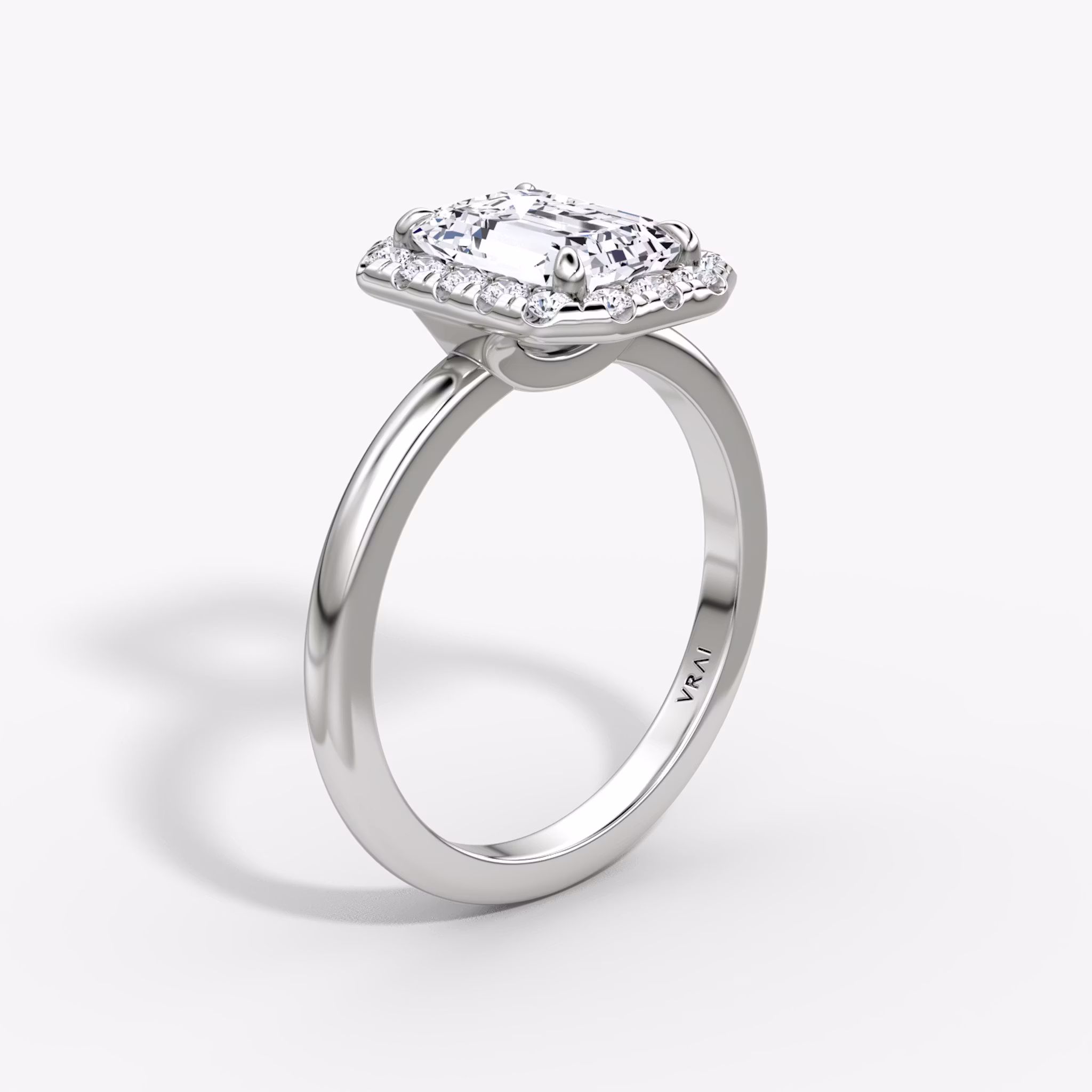 The Halo | Emerald | 18k | White Gold | bandAccent: Plain | haloSize: large | diamondOrientation: vertical | caratWeight: other