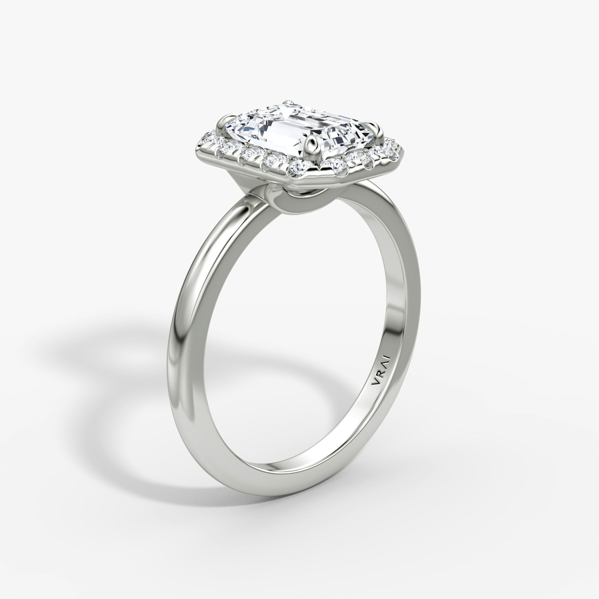 The Halo | Emerald | 18k | White Gold | bandAccent: Plain | haloSize: large | diamondOrientation: vertical | caratWeight: other