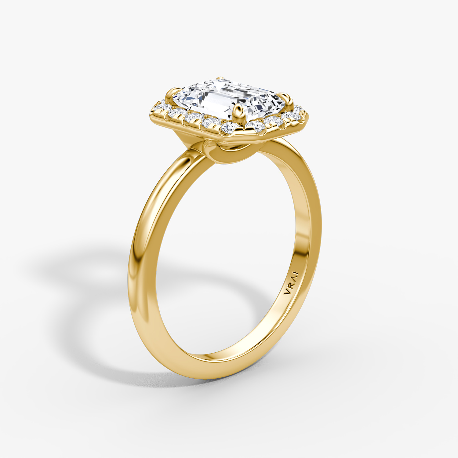 Halo | Emerald | 18k | Gelbgold | bandAccent: Ohne Pavé-Besatz | haloSize: large | diamondOrientation: vertical | caratWeight: other
