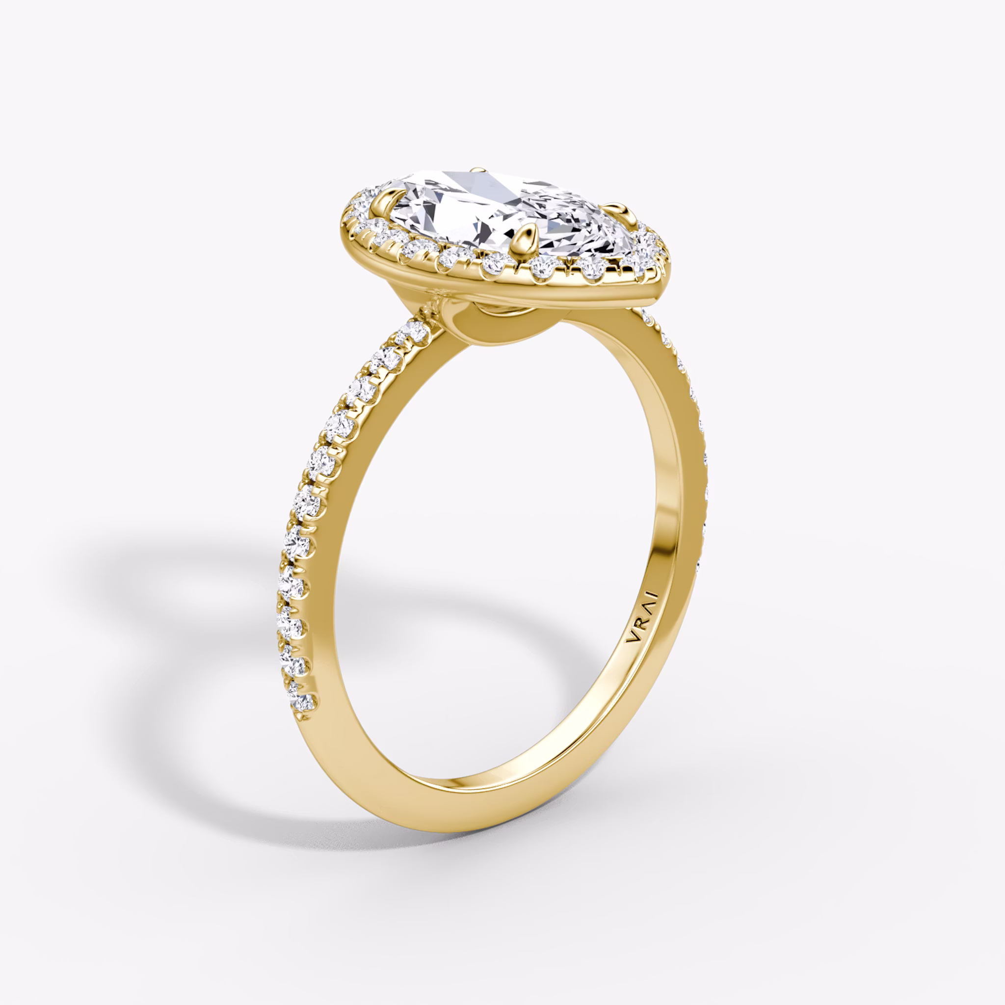 Anillo de compromiso Halo | Marquise | 18k | Oro amarillo | bandAccent: Pavé | haloSize: original | diamondOrientation: vertical | caratWeight: other