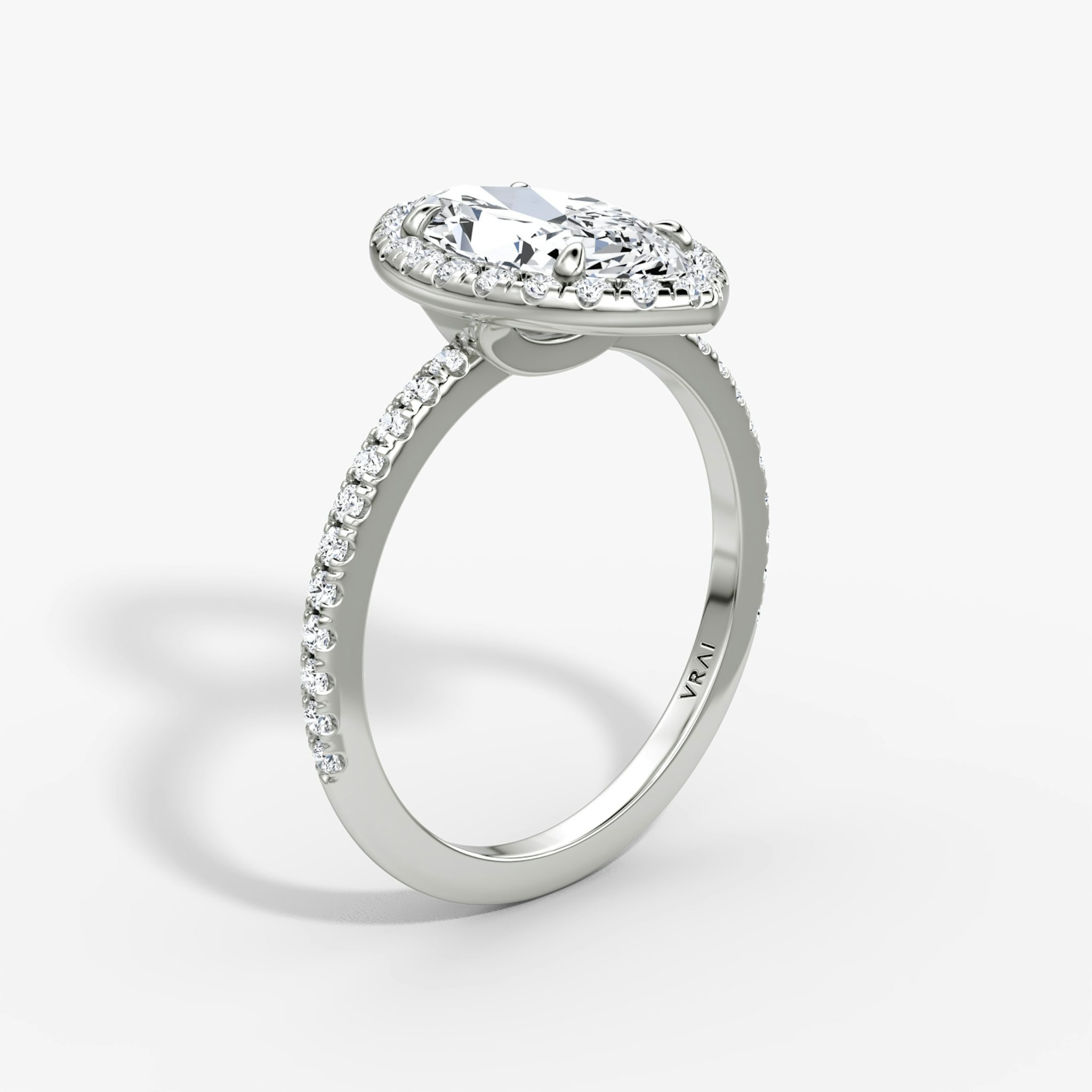 The Halo | Marquise | Platinum | bandAccent: Pavé | haloSize: original | diamondOrientation: vertical | caratWeight: other
