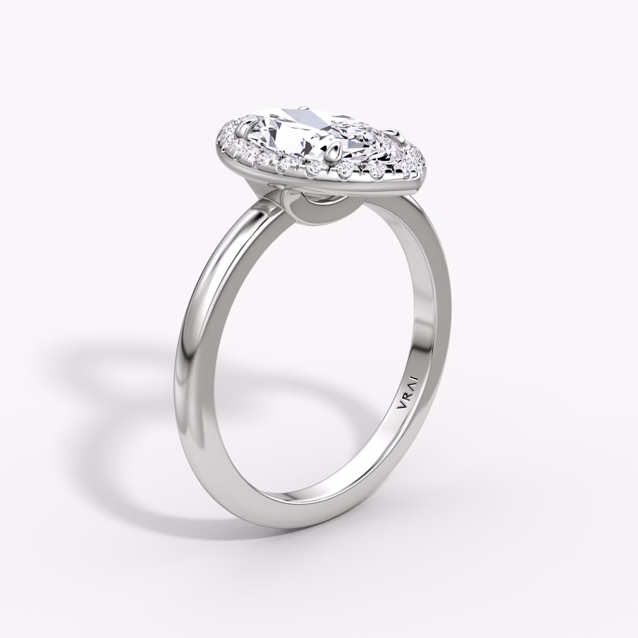 The Halo | Marquise | Platinum | bandAccent: Plain | haloSize: original | diamondOrientation: vertical | caratWeight: other