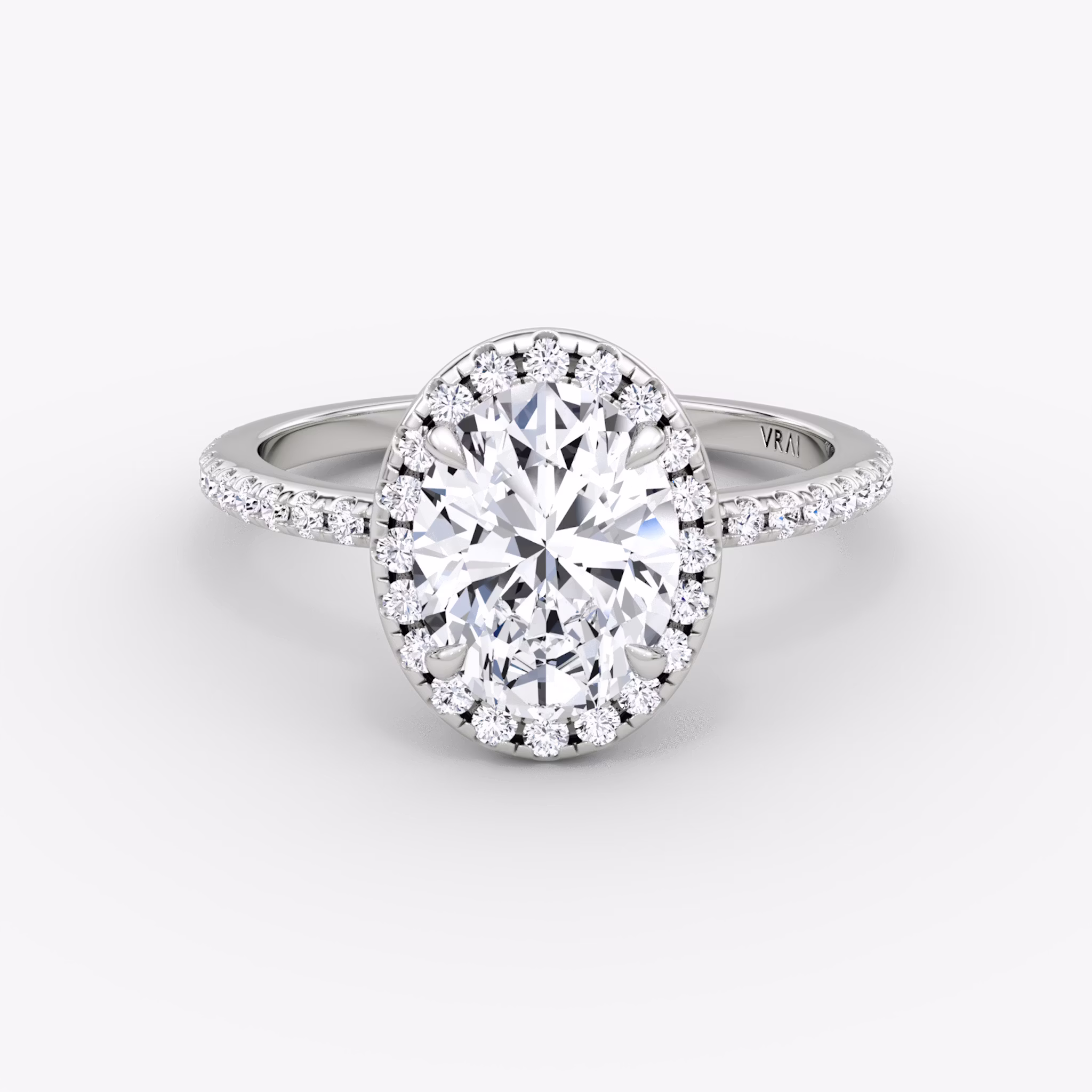 The Halo | Oval | 18k | White Gold | bandAccent: Pavé | haloSize: original | diamondOrientation: vertical | caratWeight: other