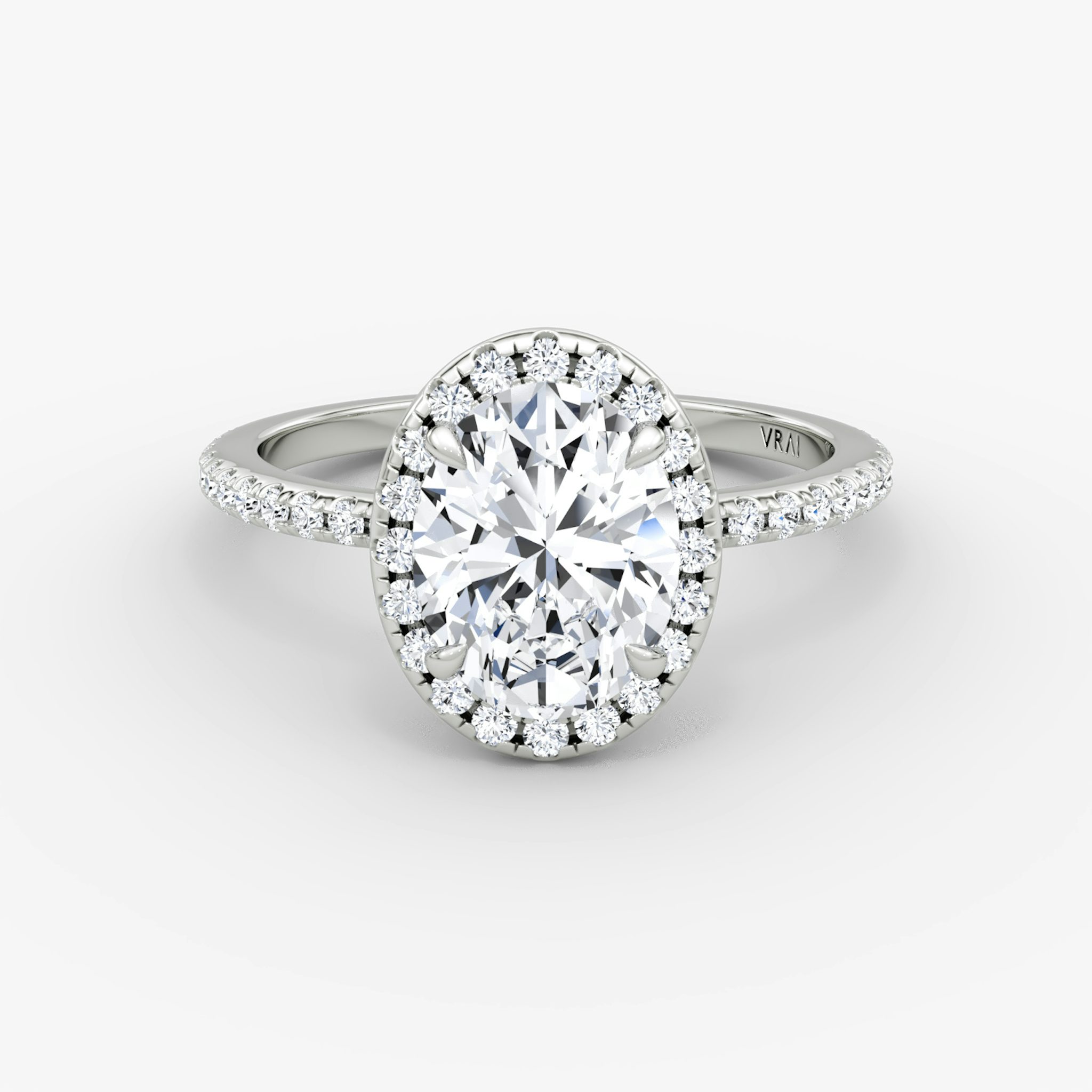 The Halo | Oval | 18k | White Gold | bandAccent: Pavé | haloSize: original | diamondOrientation: vertical | caratWeight: other