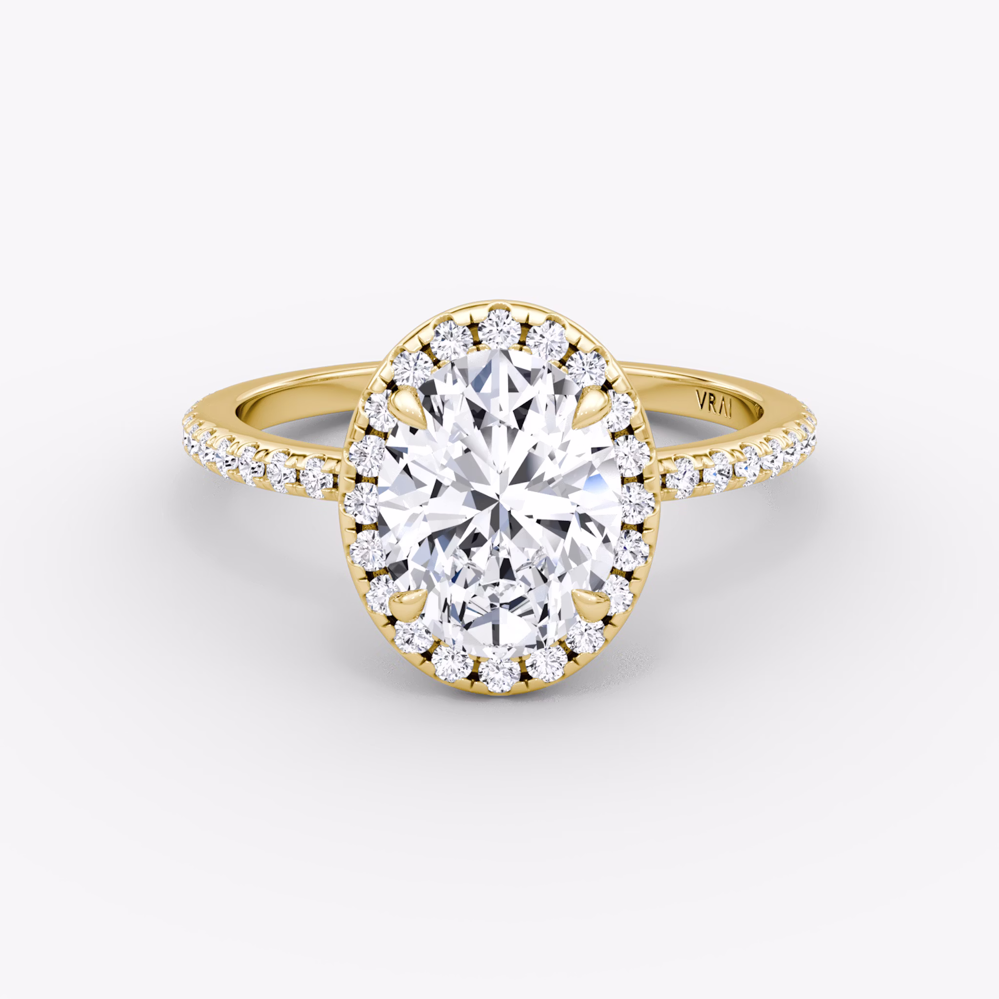 The Halo | Oval | 18k | Yellow Gold | bandAccent: Pavé | haloSize: original | diamondOrientation: vertical | caratWeight: other