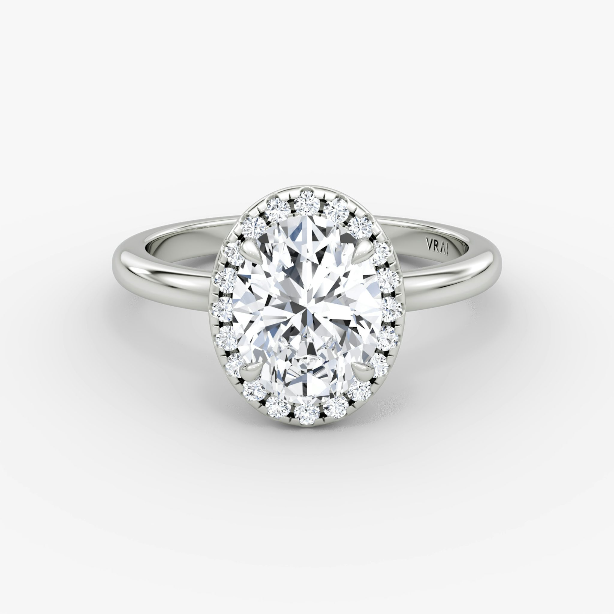 The Halo | Oval | Platinum | bandAccent: Plain | haloSize: original | diamondOrientation: vertical | caratWeight: other
