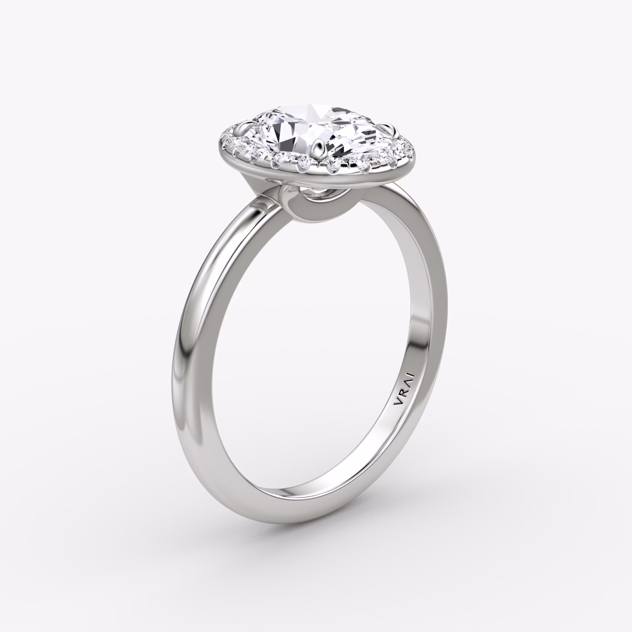 The Halo | Oval | Platinum | bandAccent: Plain | haloSize: original | diamondOrientation: vertical | caratWeight: other