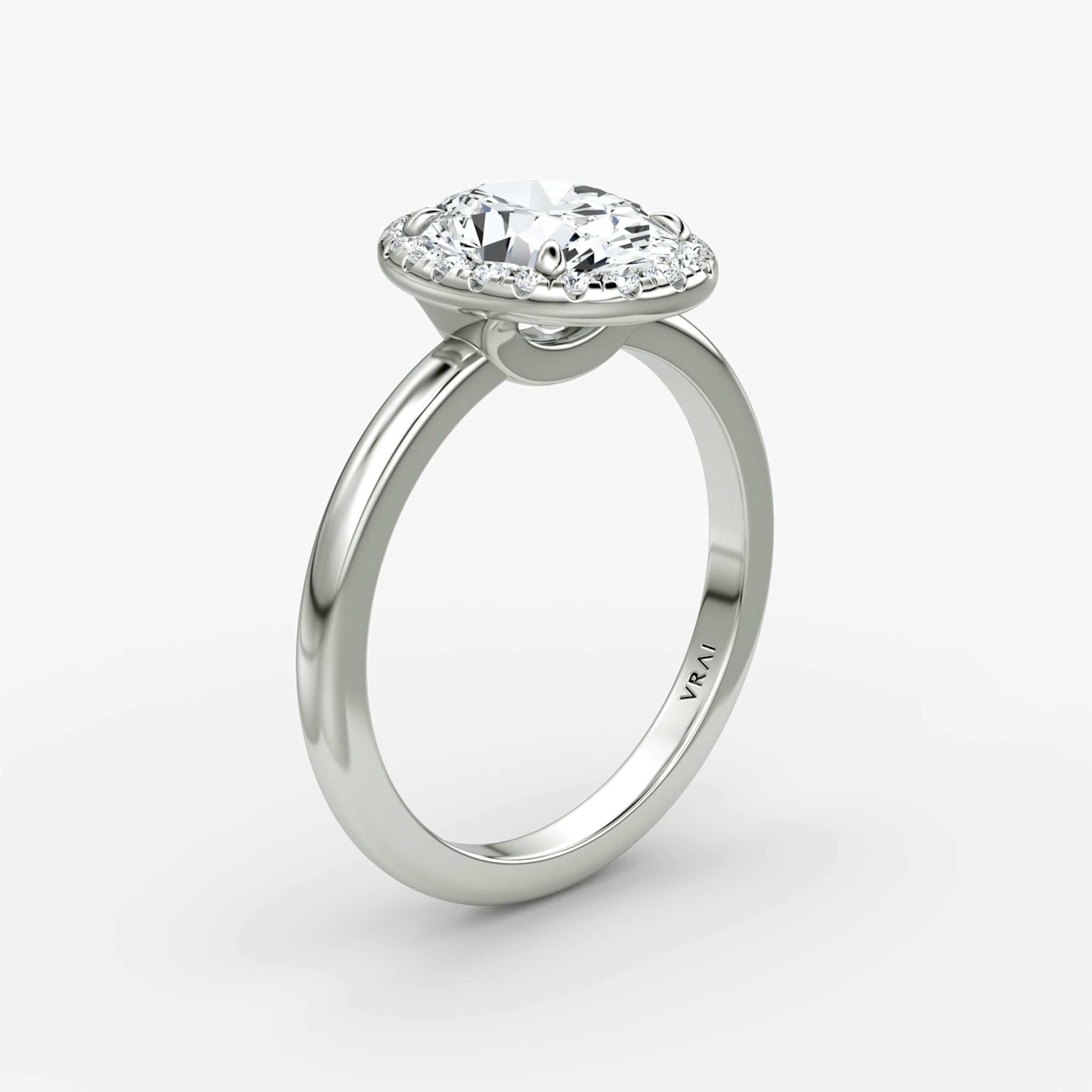 The Halo | Oval | Platinum | bandAccent: Plain | haloSize: original | diamondOrientation: vertical | caratWeight: other
