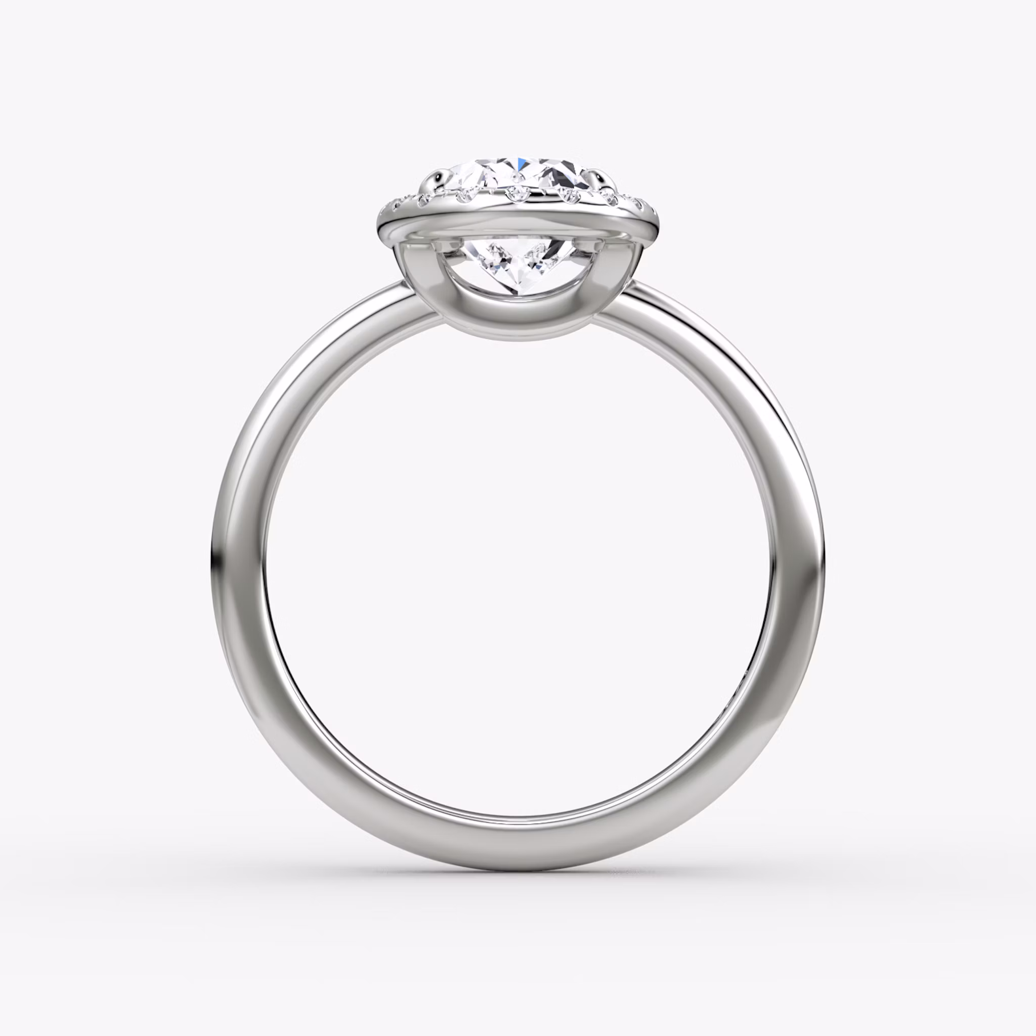 The Halo | Oval | Platinum | bandAccent: Plain | haloSize: original | diamondOrientation: vertical | caratWeight: other