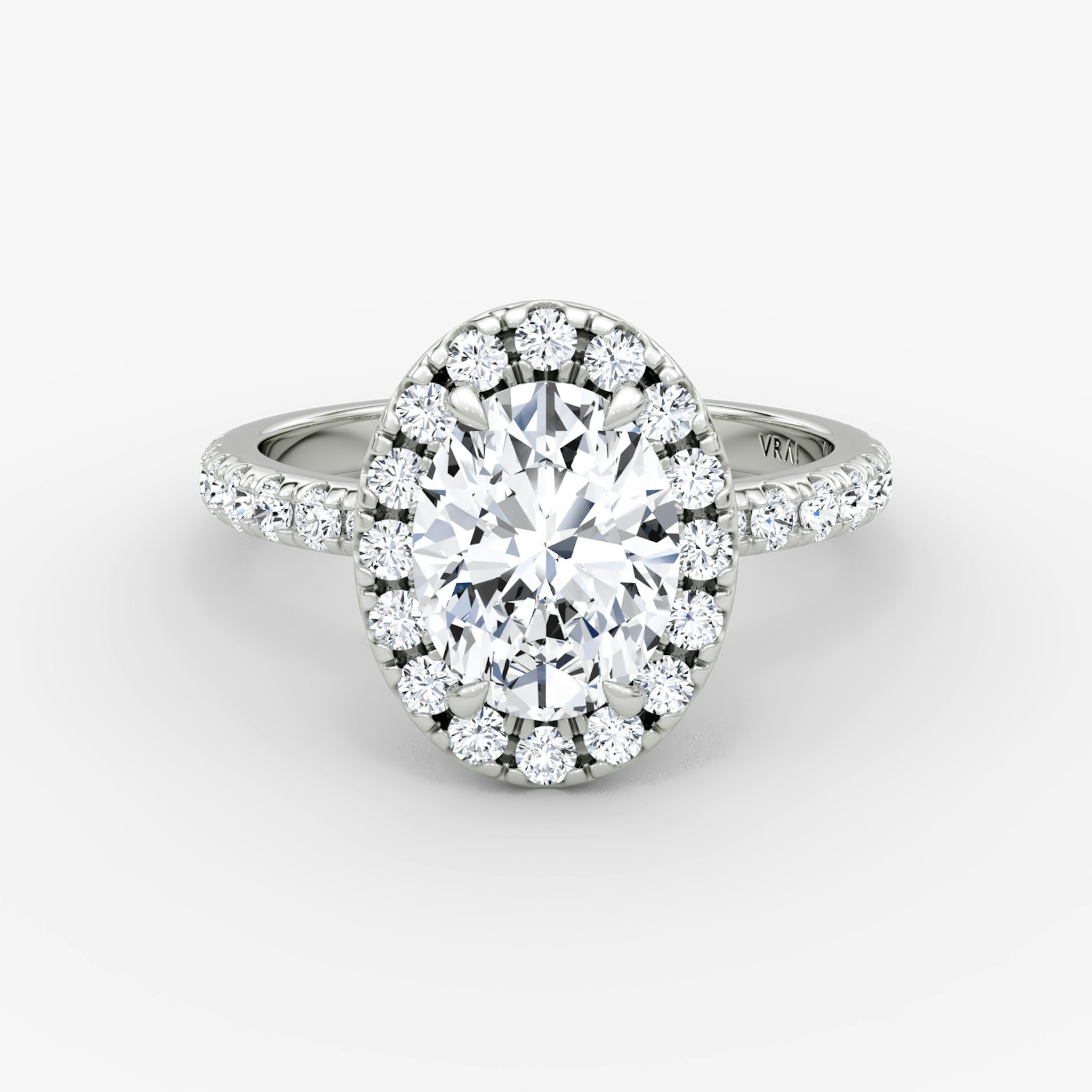 The Halo | Oval | 18k | White Gold | bandAccent: Pavé | haloSize: large | diamondOrientation: vertical | caratWeight: other