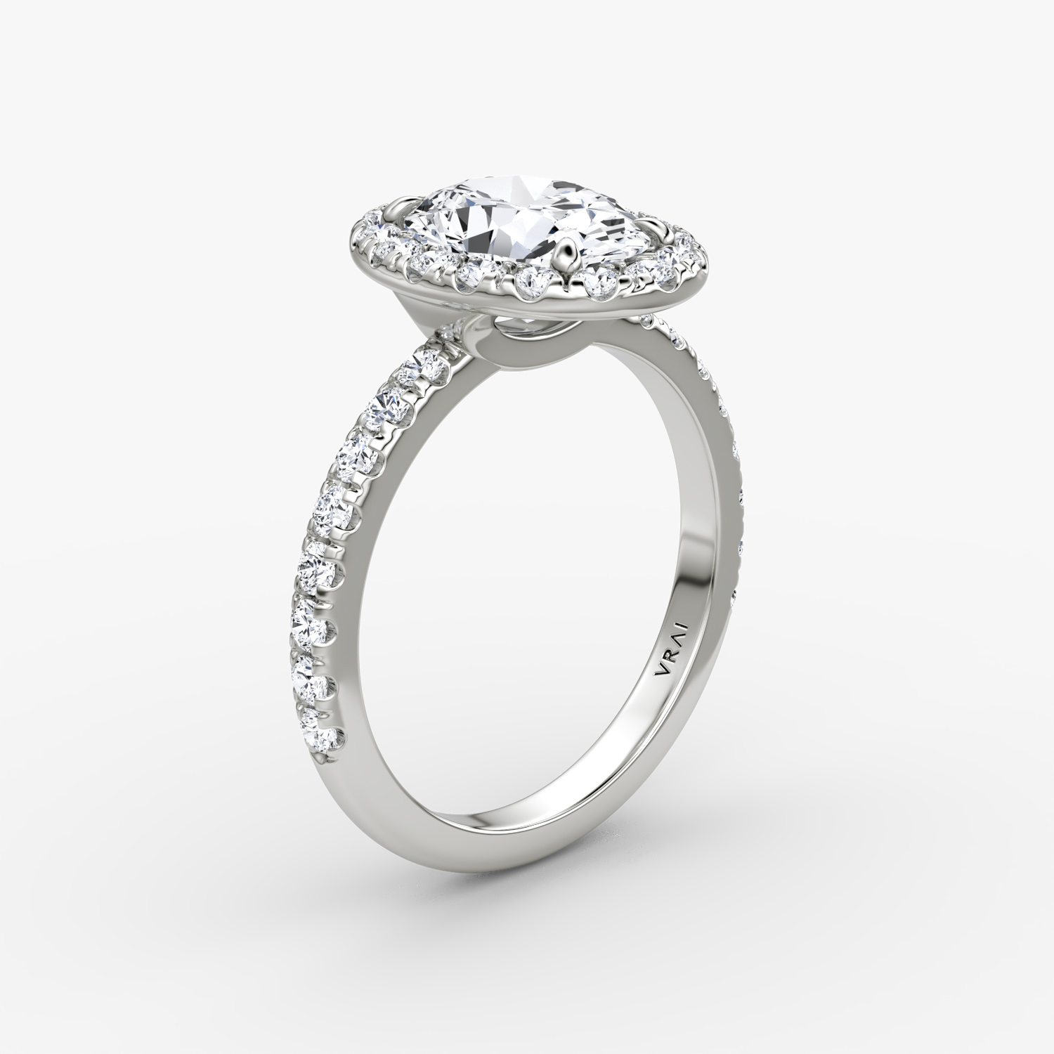 The Halo | Oval | 18k | White Gold | bandAccent: Pavé | haloSize: large | diamondOrientation: vertical | caratWeight: other