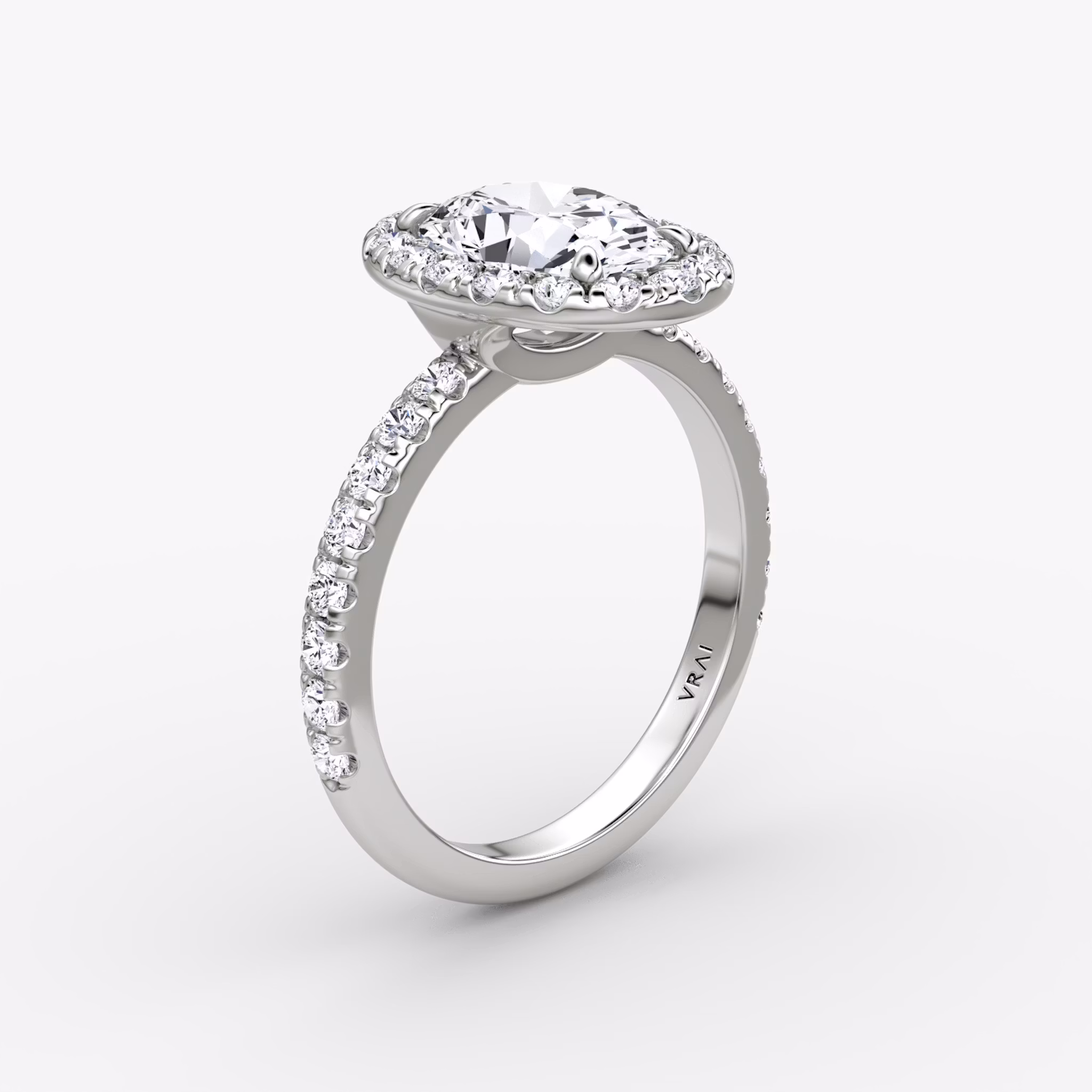 The Halo | Oval | 18k | White Gold | bandAccent: Pavé | haloSize: large | diamondOrientation: vertical | caratWeight: other