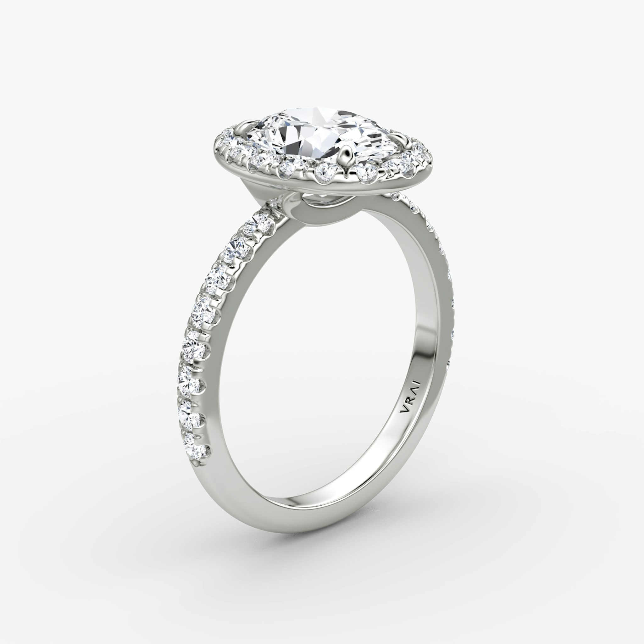 The Halo | Oval | 18k | White Gold | bandAccent: Pavé | haloSize: large | diamondOrientation: vertical | caratWeight: other