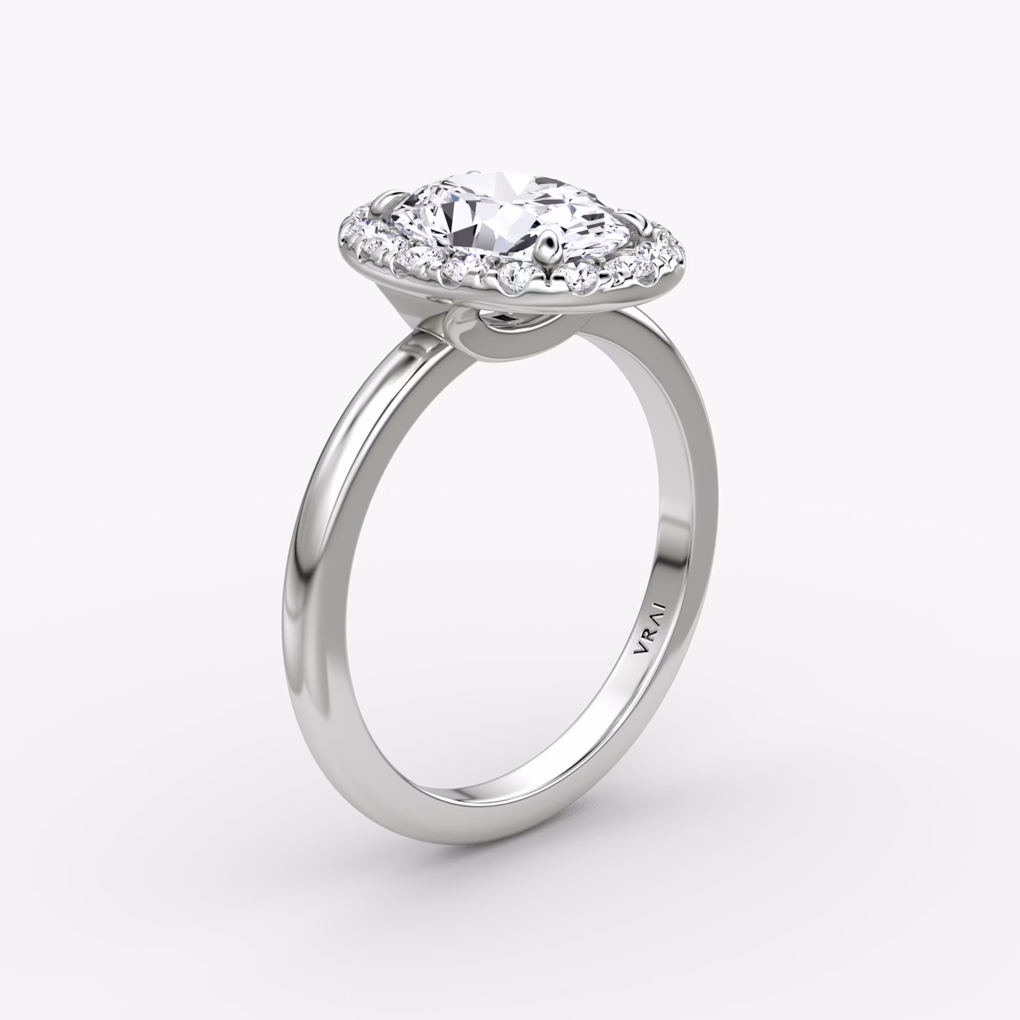The Halo | Oval | 18k | White Gold | bandAccent: Plain | haloSize: large | diamondOrientation: vertical | caratWeight: other