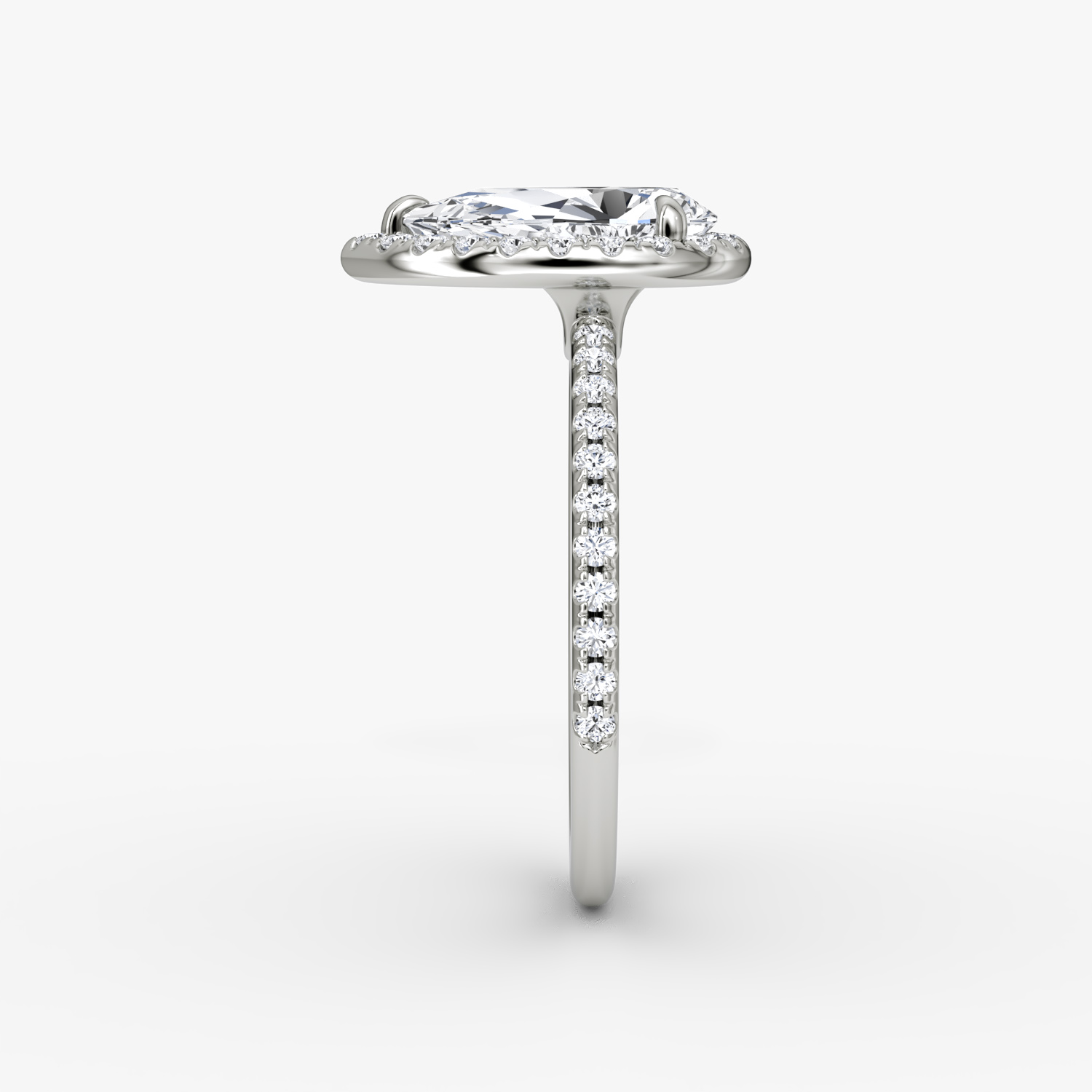 The Halo | Pear | Platinum | bandAccent: Pavé | haloSize: original | diamondOrientation: vertical | caratWeight: other