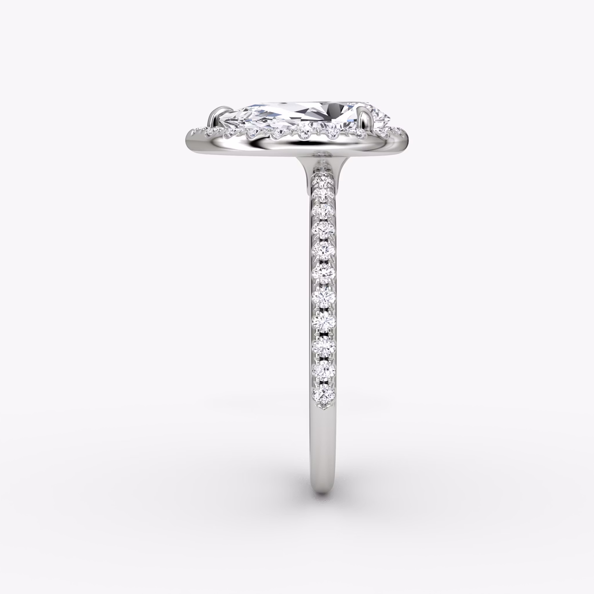 The Halo | Pear | Platinum | bandAccent: Pavé | haloSize: original | diamondOrientation: vertical | caratWeight: other