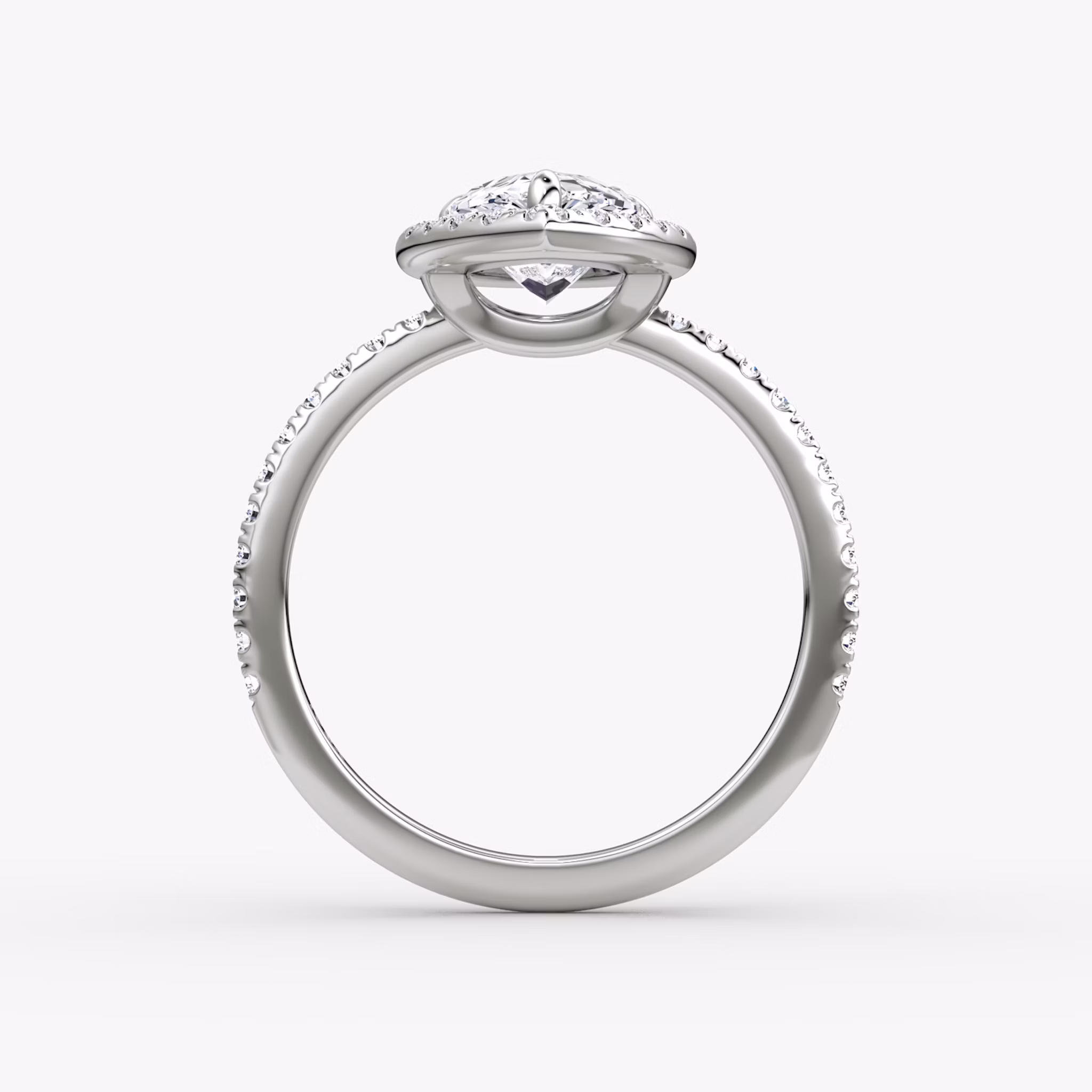 The Halo | Pear | Platinum | bandAccent: Pavé | haloSize: original | diamondOrientation: vertical | caratWeight: other
