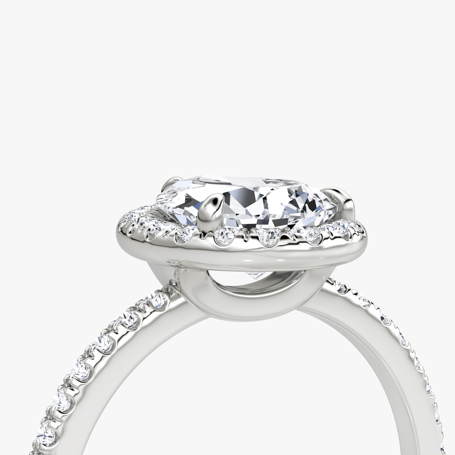 The Halo | Pear | Platinum | bandAccent: Pavé | haloSize: original | diamondOrientation: vertical | caratWeight: other