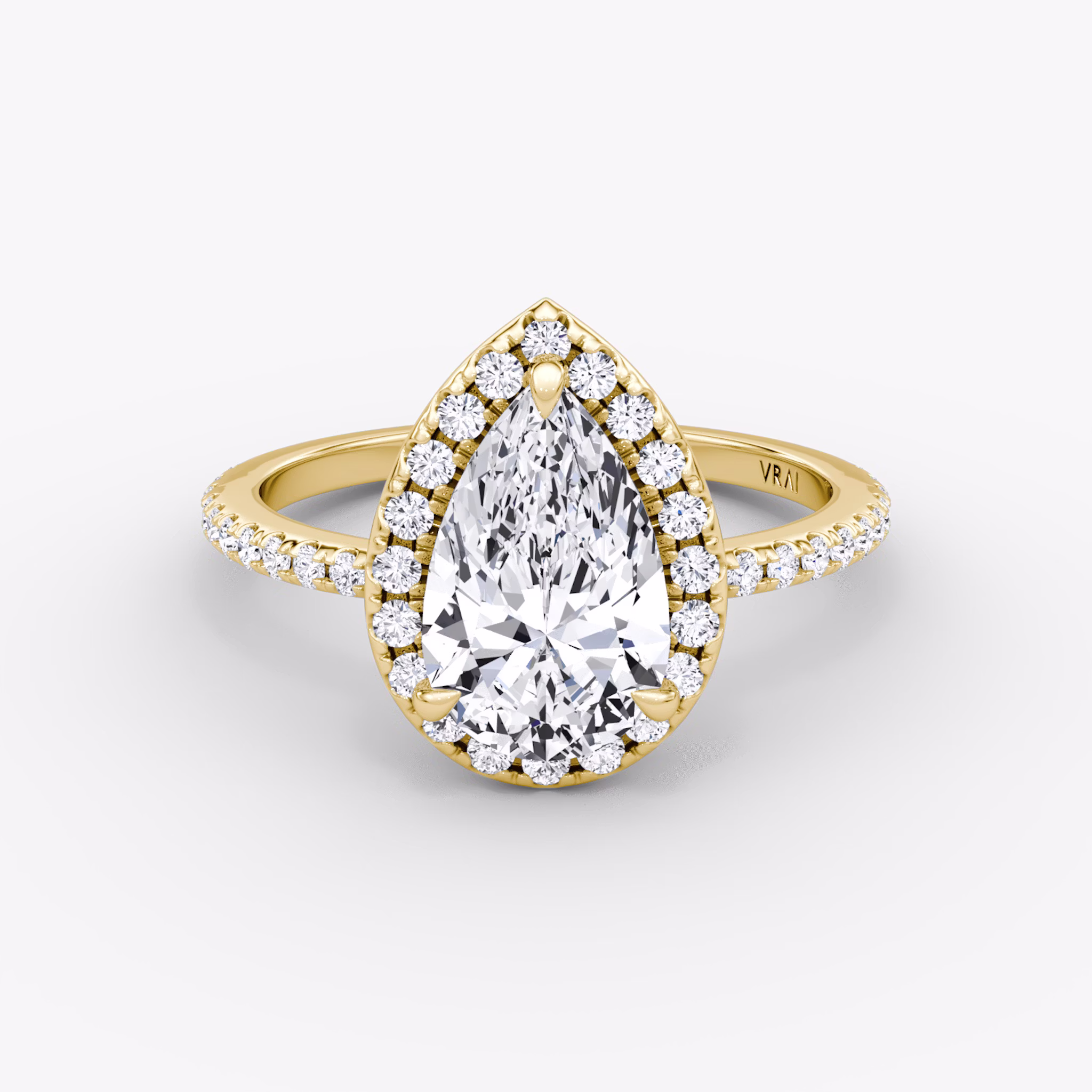 The Halo | Pear | 18k | Yellow Gold | bandAccent: Pavé | haloSize: original | diamondOrientation: vertical | caratWeight: other