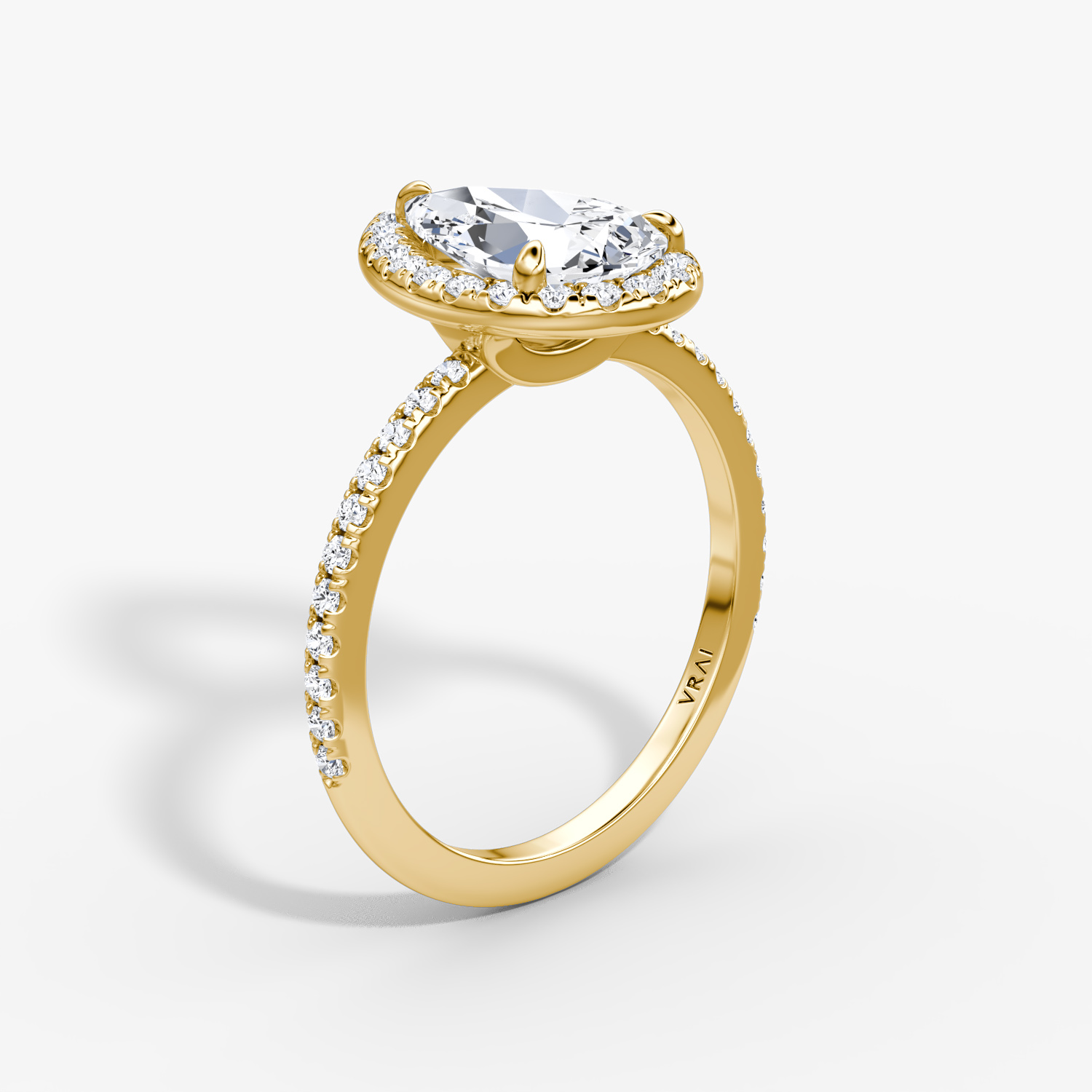 The Halo | Pear | 18k | Yellow Gold | bandAccent: Pavé | haloSize: original | diamondOrientation: vertical | caratWeight: other