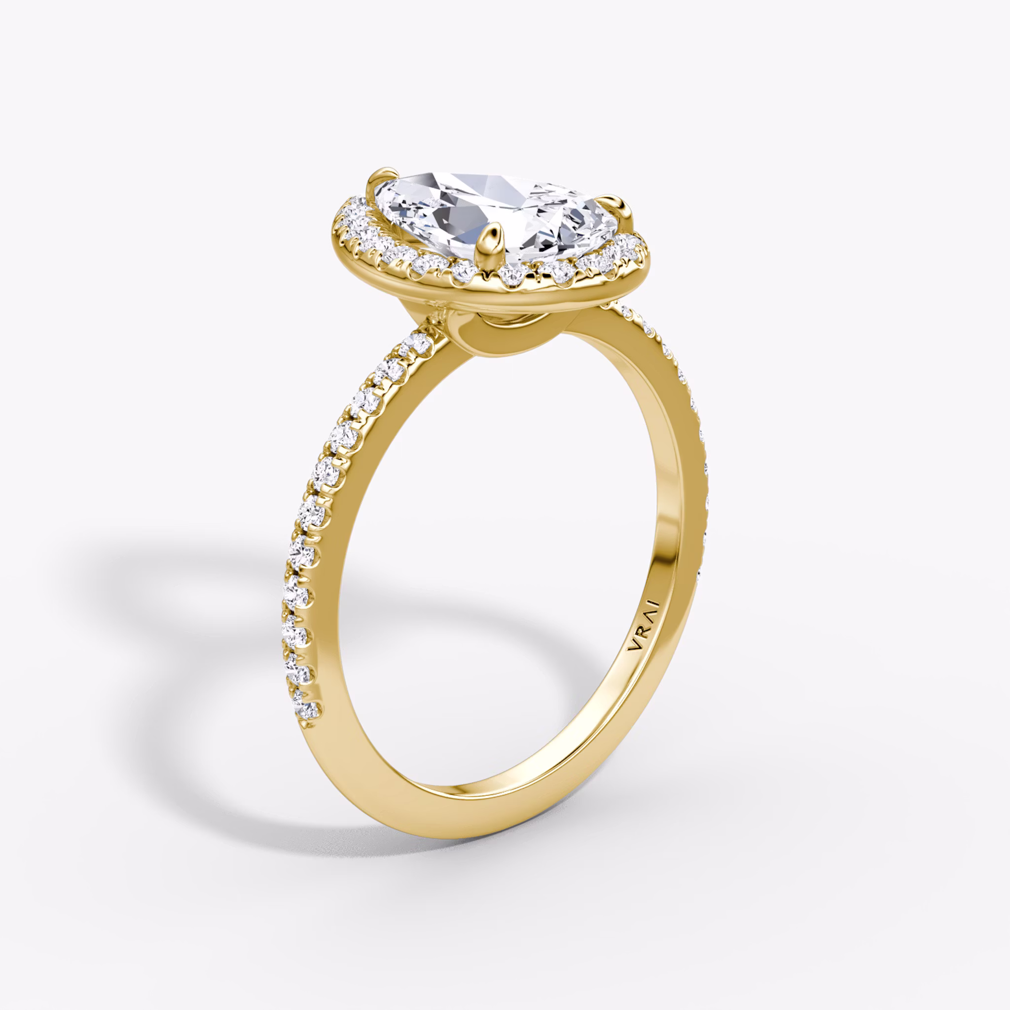 The Halo | Pear | 18k | Yellow Gold | bandAccent: Pavé | haloSize: original | diamondOrientation: vertical | caratWeight: other