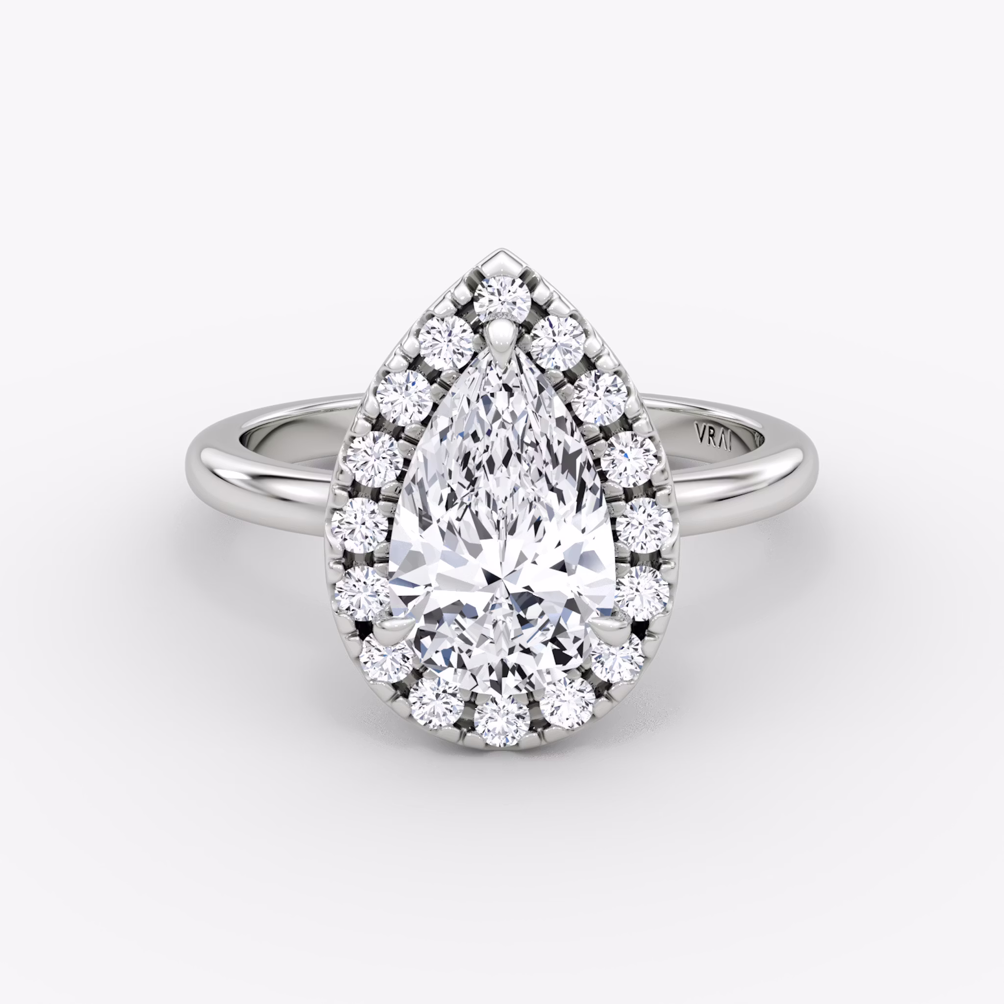 The Halo | Pear | Platinum | bandAccent: Plain | haloSize: large | diamondOrientation: vertical | caratWeight: other