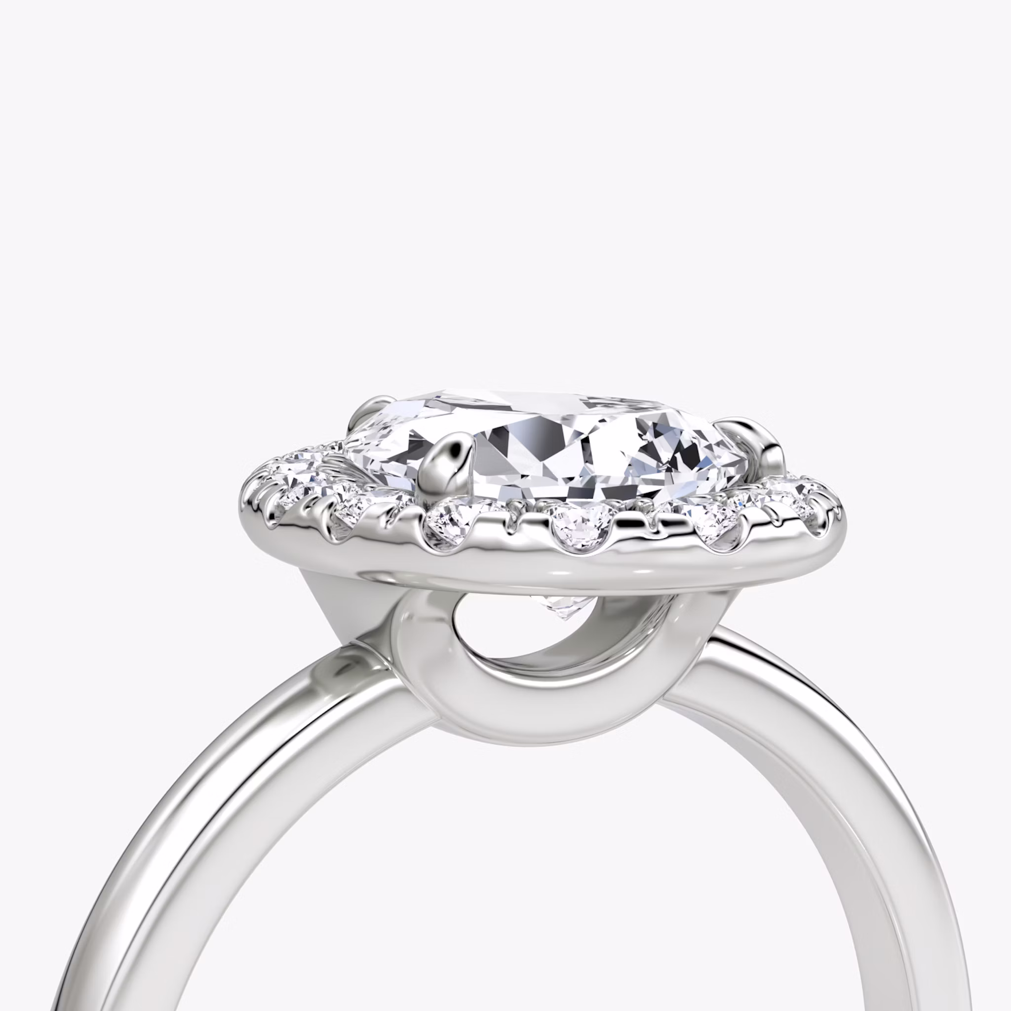 The Halo | Pear | Platinum | bandAccent: Plain | haloSize: large | diamondOrientation: vertical | caratWeight: other