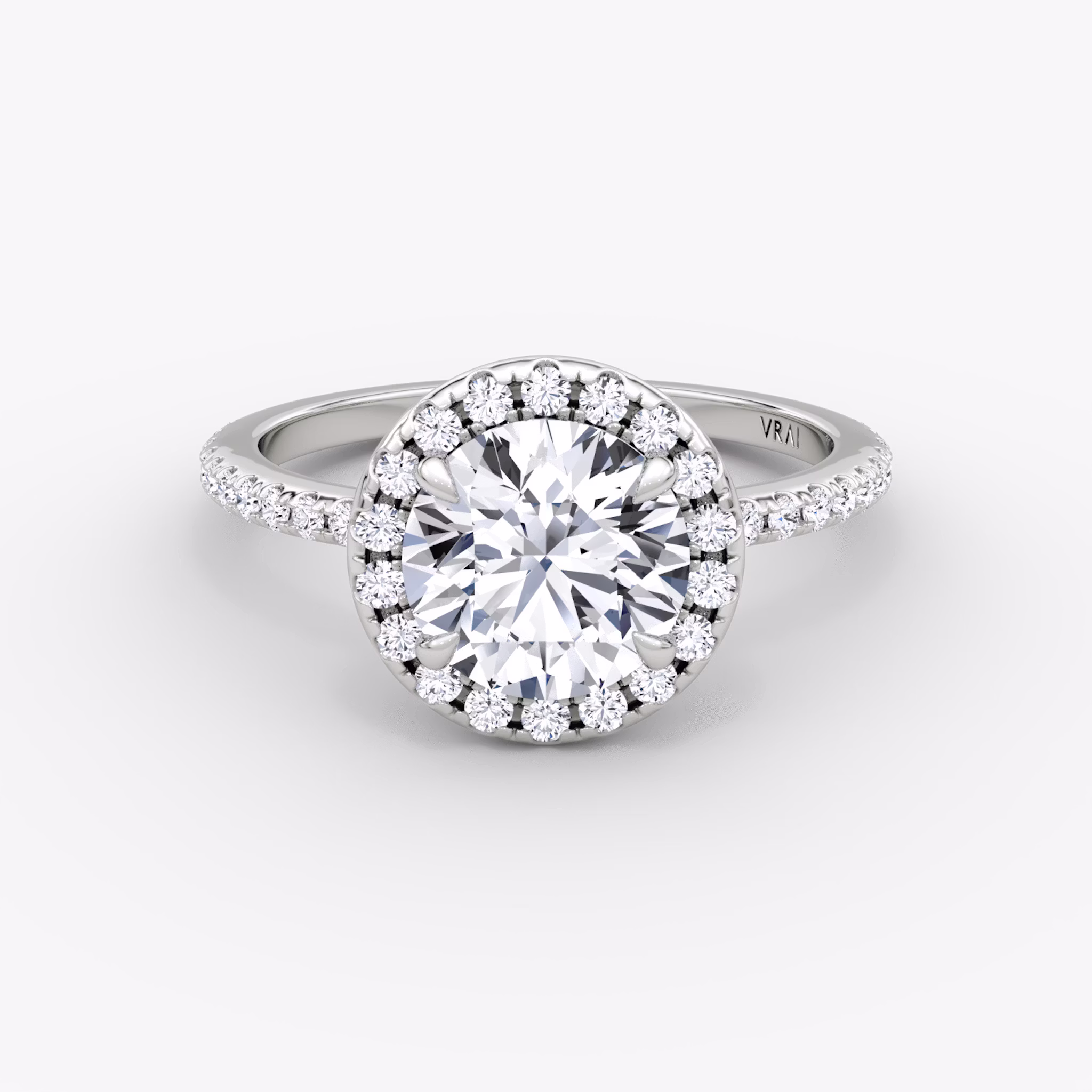 The Halo | Round Brilliant | Platinum | bandAccent: Pavé | caratWeight: 1.0ct | haloSize: original | diamondOrientation: vertical