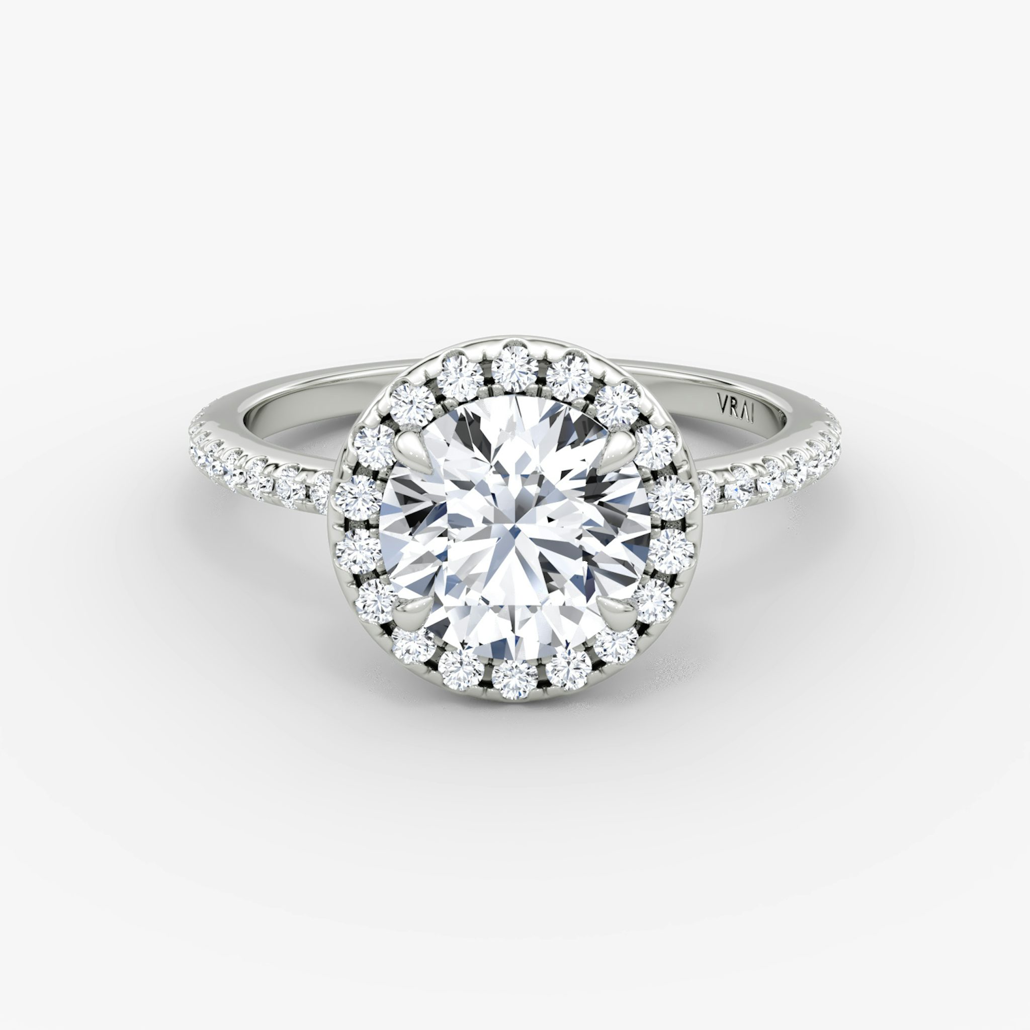 The Halo | Round Brilliant | Platinum | bandAccent: Pavé | caratWeight: 1.0ct | haloSize: original | diamondOrientation: vertical